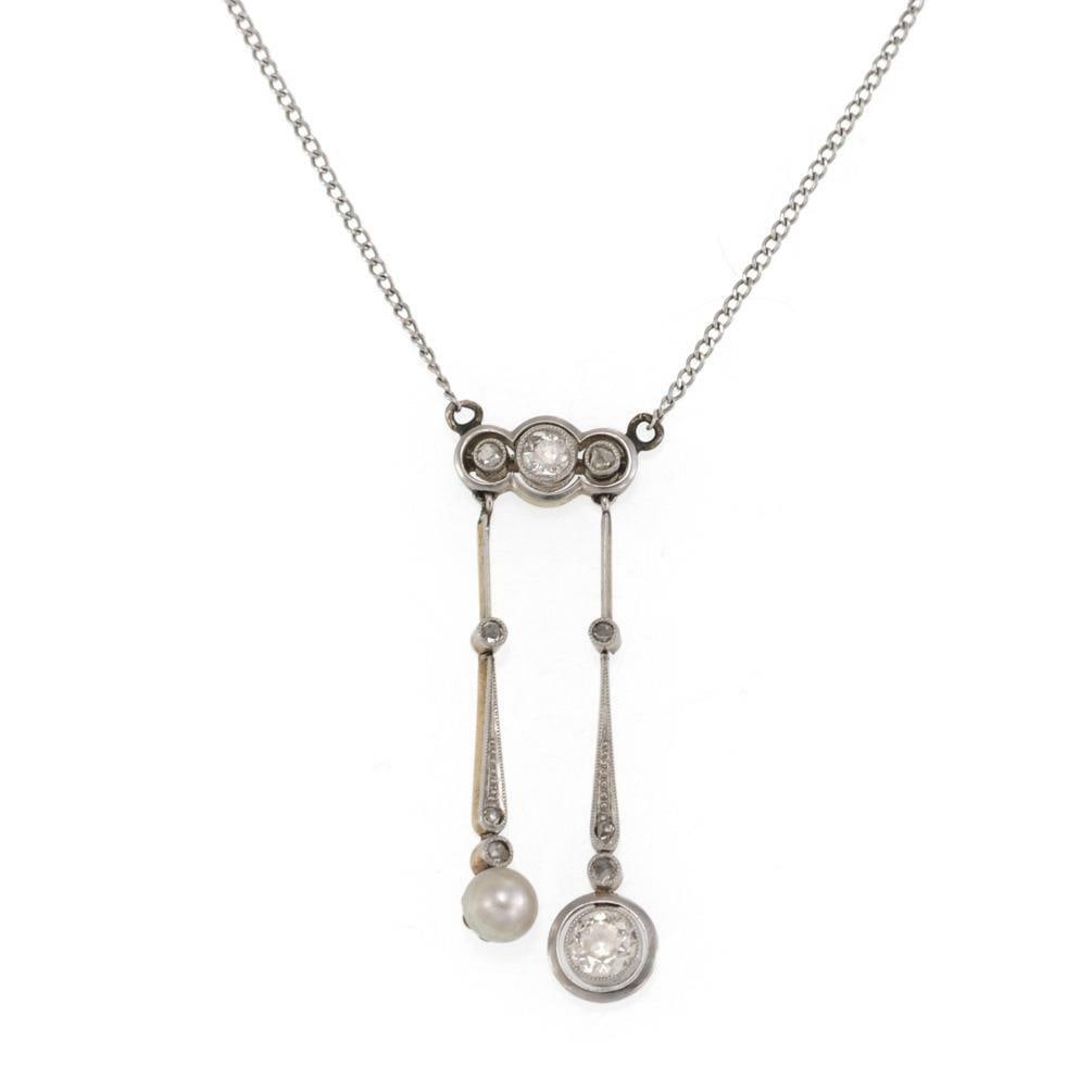 Victorian Diamond Pendant Necklace Platinum 18k Gold with Pearl: Victorian Diamond Pendant Necklace Platinum 18k Gold with Pearl This exquisite Victorian pendant necklace is a stunning blend of craftsmanship and elegance. Made from platinum and featuring a delicate