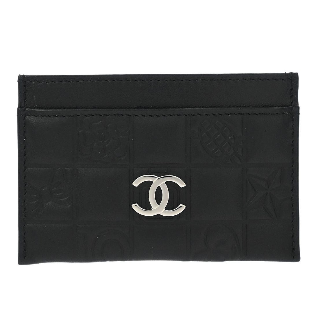Black Leather Card Wallet by Chanel with Icon Logo Accent: Black Leather Card Wallet by Chanel with Icon Logo Accent This Chanel cardholder is crafted from black lambskin leather and features the iconic logo accent. Designed as a compact card wallet, it offer
