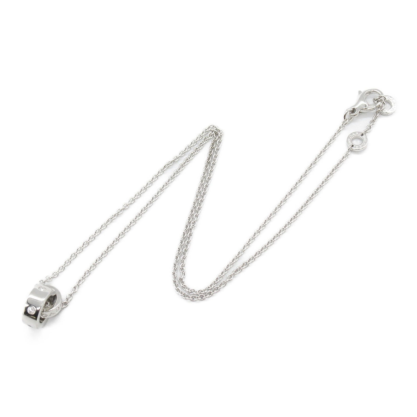 White Gold Pendant Necklace for Women by Bulgari: White Gold Pendant Necklace for Women by Bulgari This Bulgari necklace is crafted from white gold and features a silver color. Designed for women, it includes a pendant measuring 14mm by 4.7mm and an