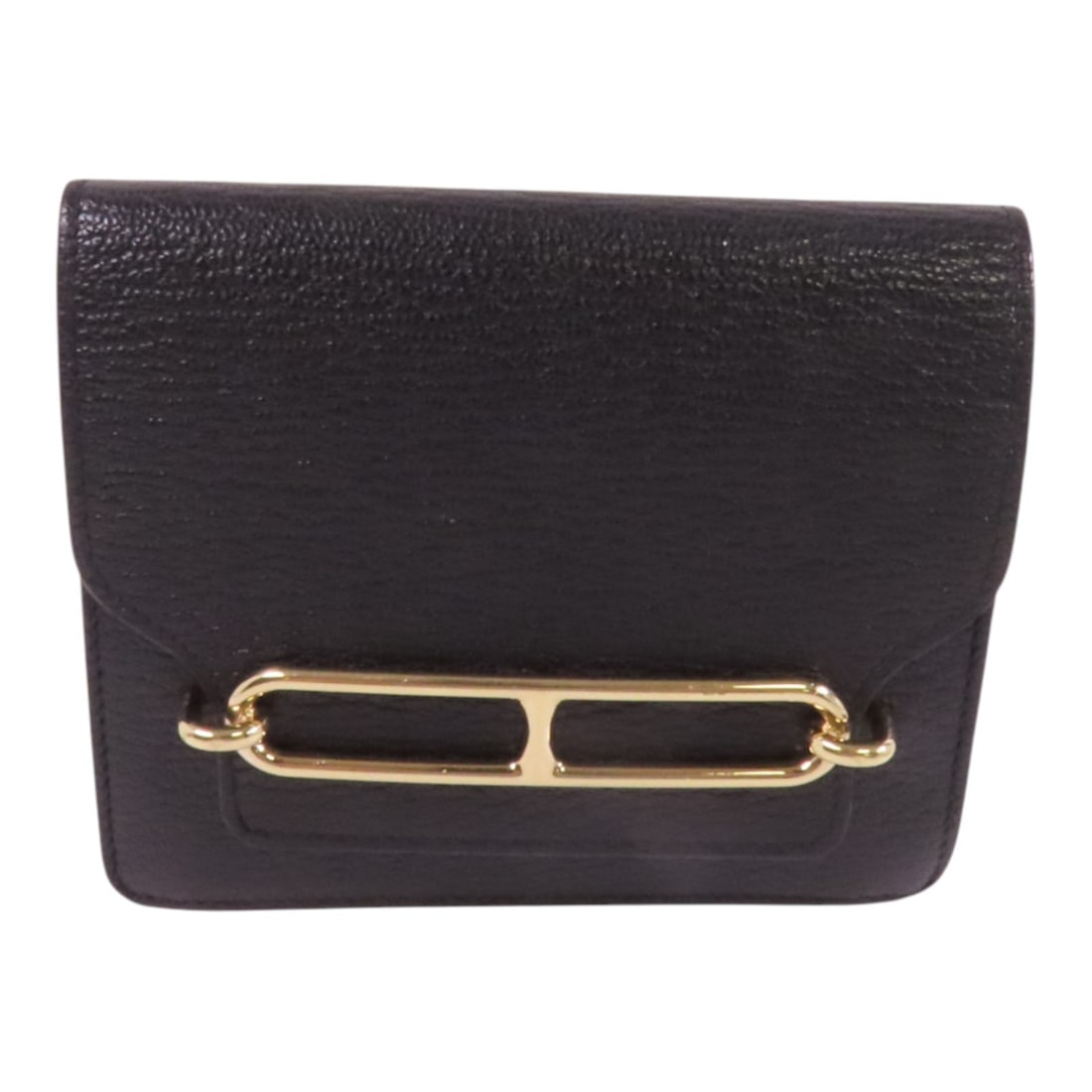 HERMES Roulis Slim Bi-fold Wallet Black Chevre Leather GHW: HERMES Roulis Slim Bi-fold Wallet Black Chevre Leather GHW This elegant HERMES bi-fold wallet is crafted from premium goatskin leather, offering a luxurious feel and durability. The wallet features a
