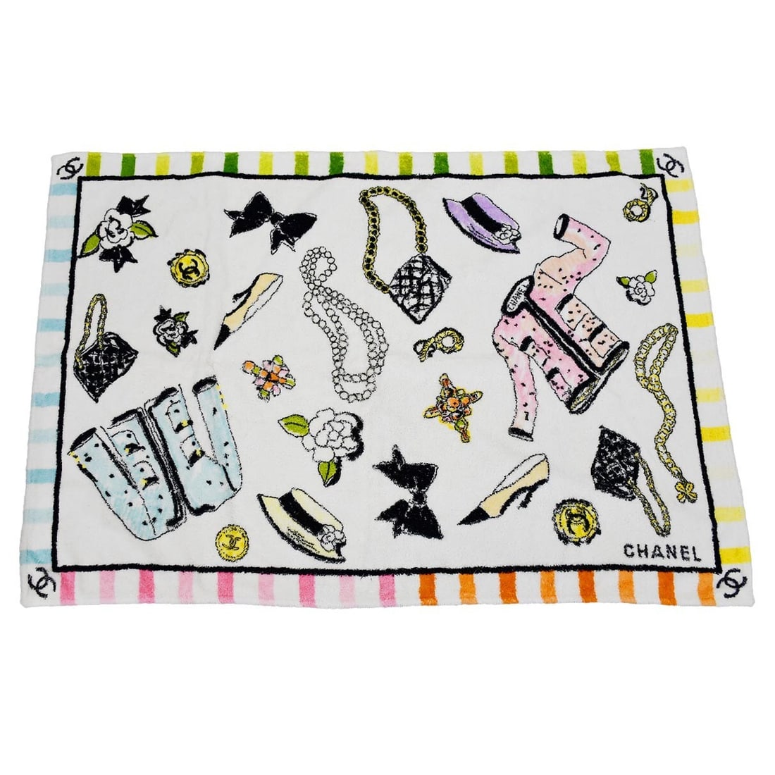 Chanel Icon Beach Towel White Stylish Essential: Chanel Icon Beach Towel White Stylish Essential Elevate your beach outings with this luxurious Chanel Icon Beach Towel, crafted in France. This stylish towel features the iconic Chanel logo and is per