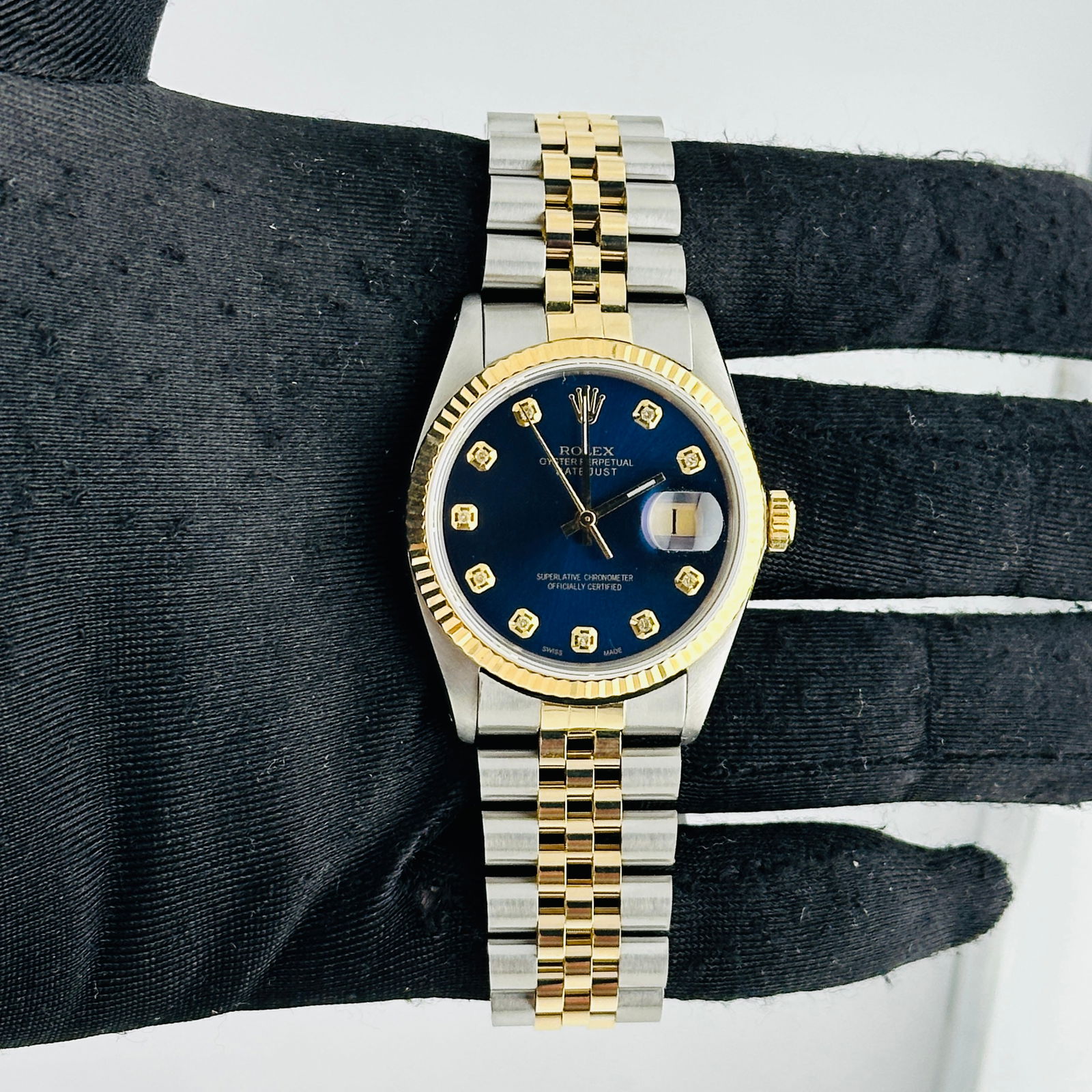 AM Blue Diamond Dial Rolex Datejust 16013 with Aftermarket Jubilee Bracelet: AM Blue Diamond Dial Rolex Datejust 16013 with Aftermarket Jubilee Bracelet This Rolex Datejust features an aftermarket blue diamond dial and is fitted with an aftermarket Jubilee bracelet. The watch