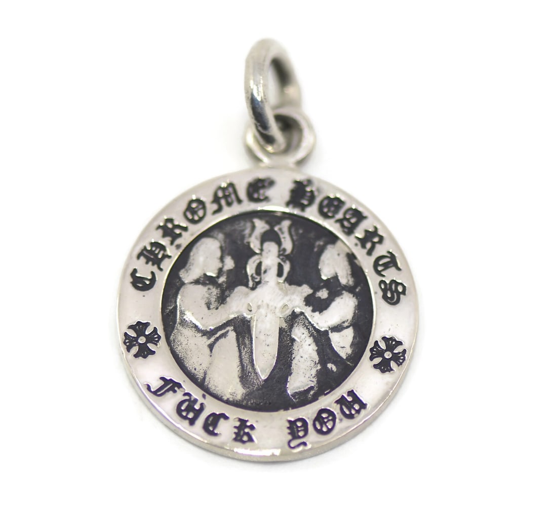 Chrome Hearts 925 Sterling Silver Pendant 19mm Authentic: Chrome Hearts 925 Sterling Silver Pendant 19mm Authentic This stunning Chrome Hearts pendant is crafted from high-quality sterling silver with a metal purity of 925. The pendant measures 19mm and