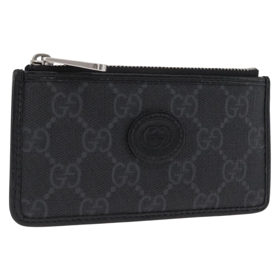 Gucci Black GG Canvas 697717 Coin Purse with Dust Bag and Box: Gucci Black GG Canvas 697717 Coin Purse with Dust Bag and Box This GUCCI GG Supreme coin purse features the brand's signature GG canvas in black, crafted in Italy. The purse offers a compact and