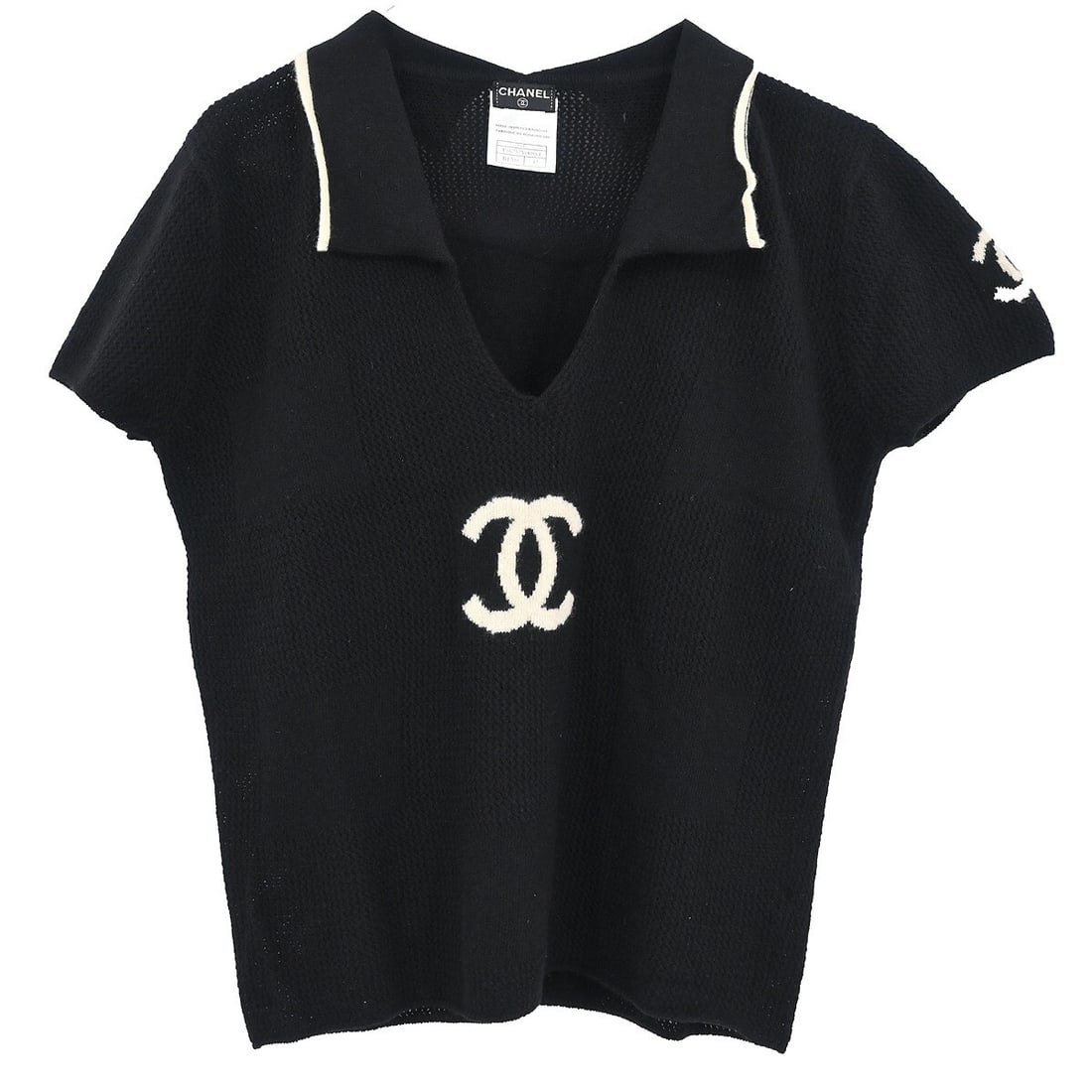 Chanel Black Cashmere Short Sleeve Collared Top Size 42: Chanel Black Cashmere Short Sleeve Collared Top Size 42 Elevate your casual wardrobe with this stunning Chanel short sleeve top. Crafted from luxurious 100% cashmere, this black top features a classic