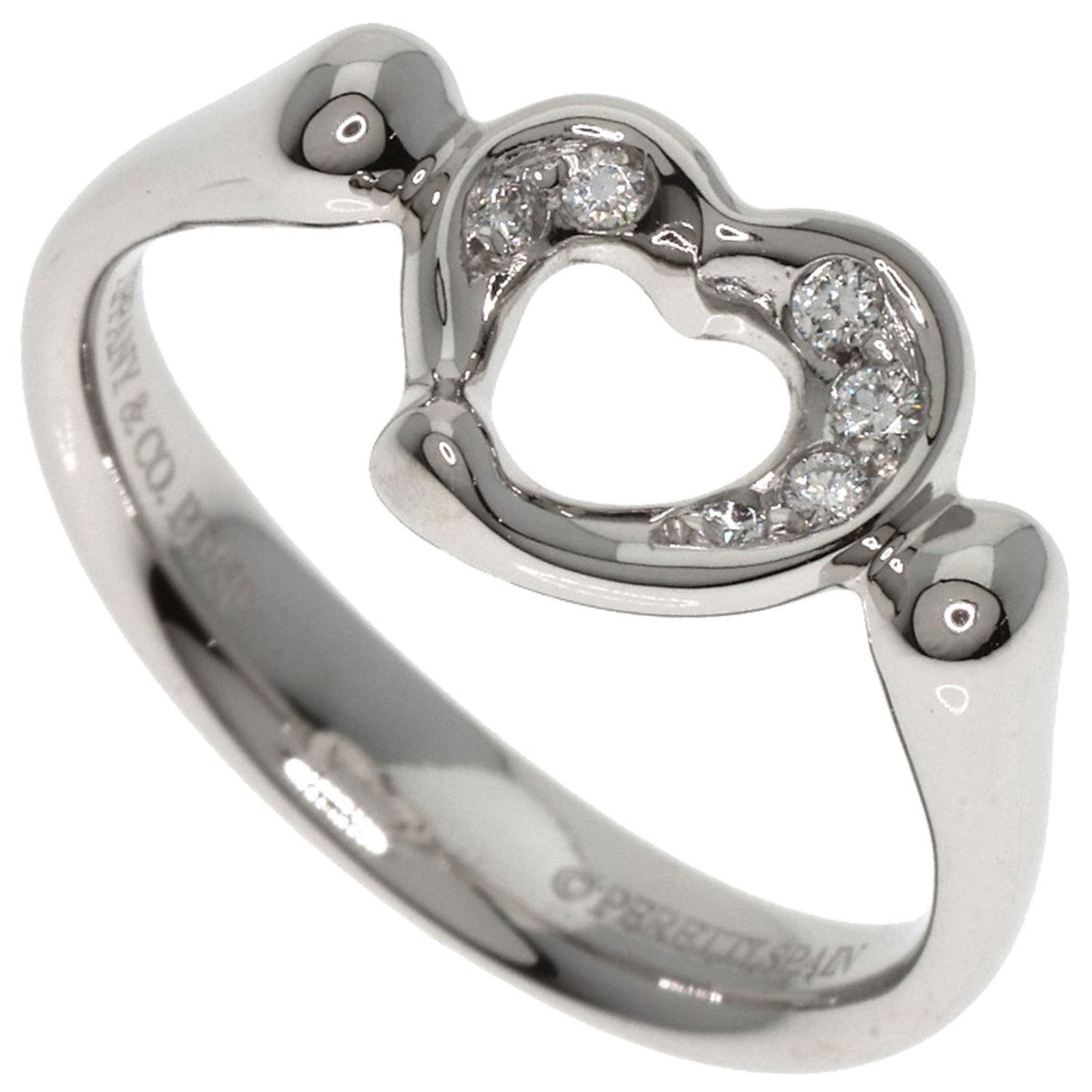 Platinum Open Heart Pendant by Tiffany & Co: Platinum Open Heart Pendant by Tiffany & Co This Tiffany & Co. Open Heart pendant features a sleek platinum construction with a silver hue. Designed for women, it has been polished and shows only slig