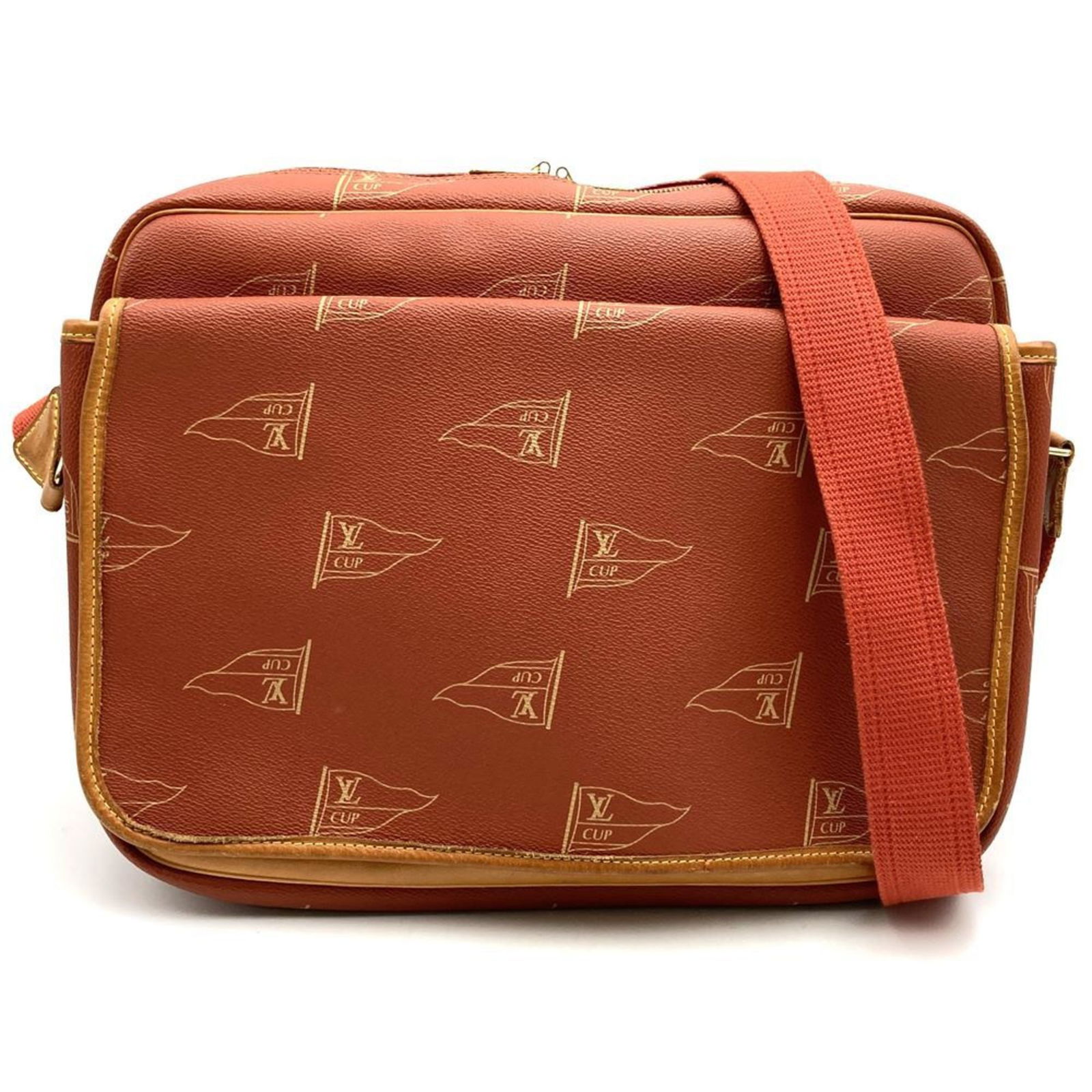 Orange Canvas Louis Vuitton Messenger Bag from France: Orange Canvas Louis Vuitton Messenger Bag from France This Louis Vuitton Messenger bag for women features an orange canvas exterior and offers a spacious design. The bag shows traces of use with visib