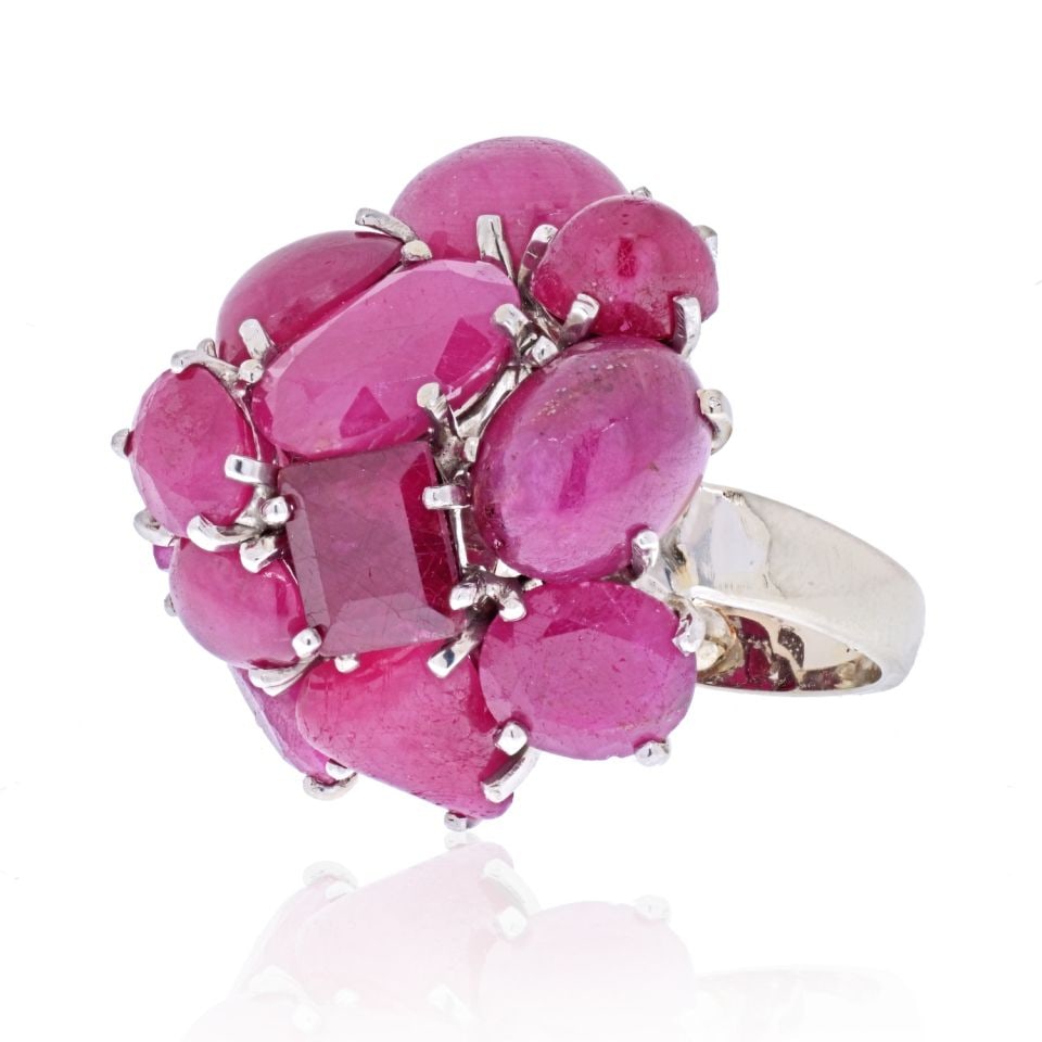 Seaman Schepps 14K White Gold Ruby Diamond Cluster Ring P.S.V.: Seaman Schepps 14K White Gold Ruby Diamond Cluster Ring P.S.V. This exquisite estate ring by Seaman Schepps features a stunning cluster design, showcasing a beautiful cabochon ruby surrounded by vario