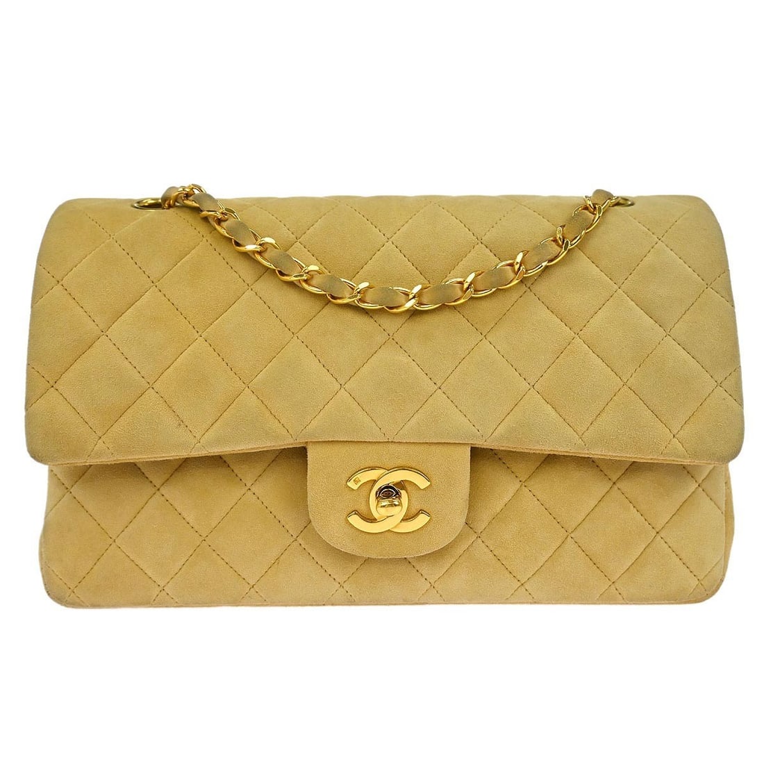 Chanel Beige Suede Medium Classic Double Flap Shoulder Bag: Chanel Beige Suede Medium Classic Double Flap Shoulder Bag This Chanel Beige Suede Medium Classic Double Flap Shoulder Bag is a timeless accessory that combines elegance with functionality. The bag fe