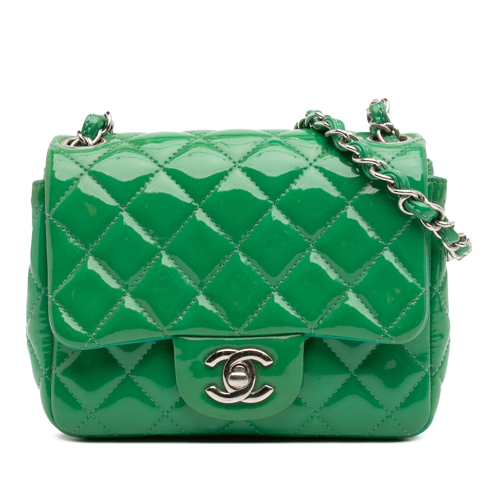 Chanel Mini Square Classic Patent Green Flap Bag: Chanel Mini Square Classic Patent Green Flap Bag This Chanel Mini Square Classic Patent Single Flap bag showcases a sophisticated design crafted from quilted patent leather in a striking green hue. It