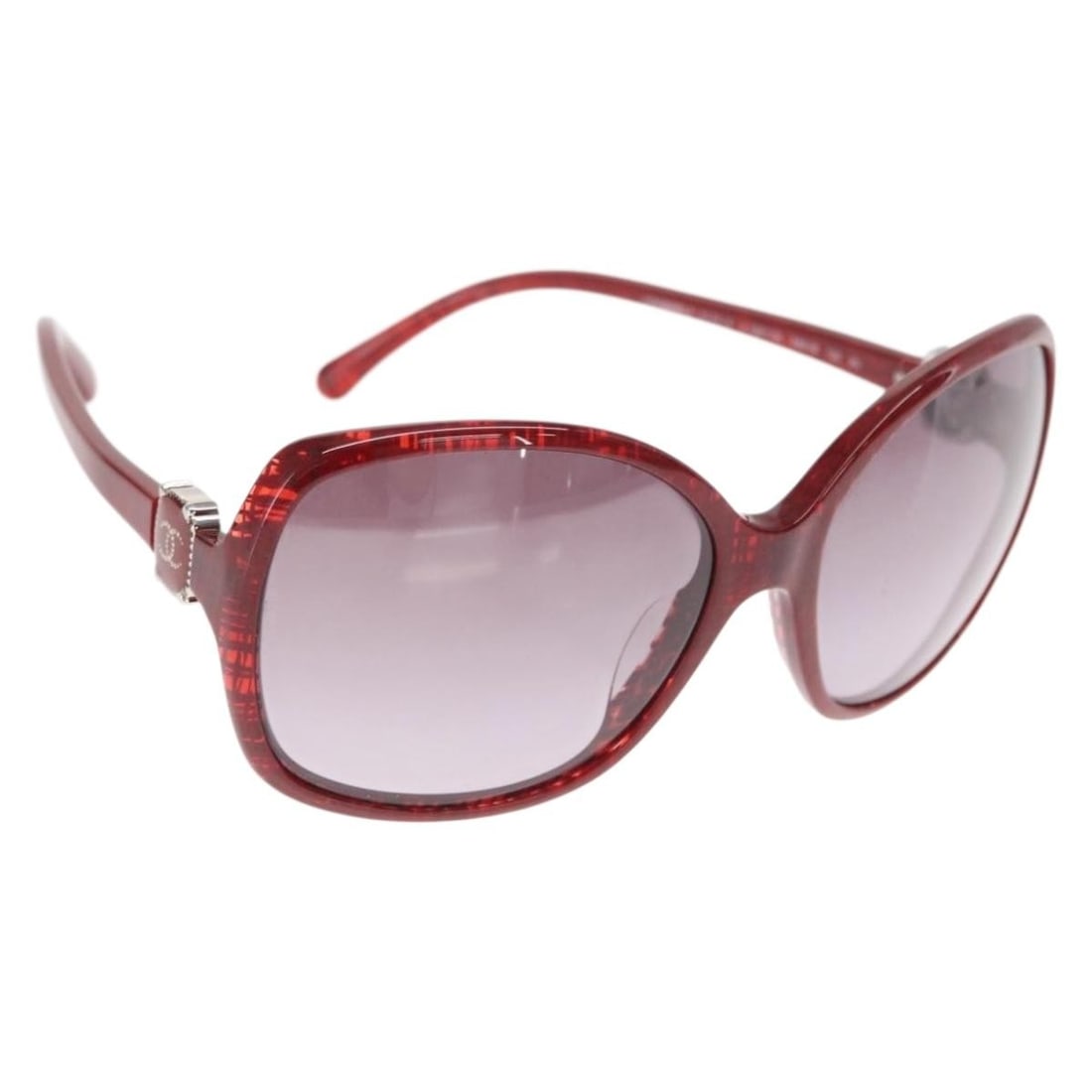Red CHANEL Plastic Sunglasses with CC Logo and Case: Red CHANEL Plastic Sunglasses with CC Logo and Case These CHANEL sunglasses feature a stylish red plastic frame with the iconic CC logo. Made in Italy, they offer a fashionable look with a durable pla