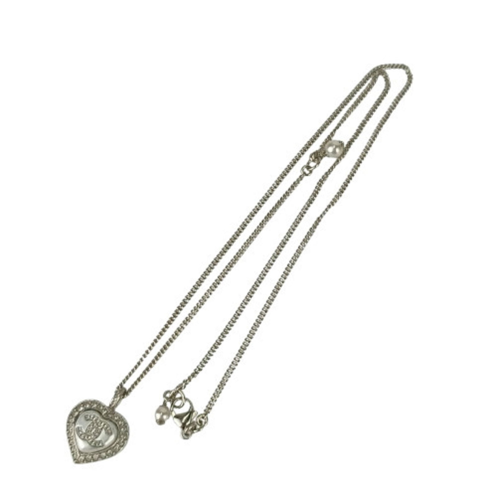 Silver Metal Necklace by Chanel Coco Mark Collection: Silver Metal Necklace by Chanel Coco Mark Collection This Chanel Coco Mark necklace features a silver-tone metal design and is crafted for women. The necklace has a neck circumference of 60 cm and is