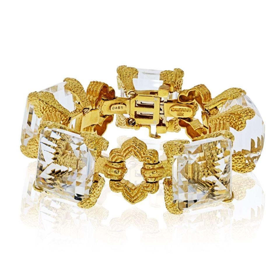 David Webb 18K Yellow Gold Rock Crystal Open Link Bracelet with Certificate: David Webb 18K Yellow Gold Rock Crystal Open Link Bracelet with Certificate This stunning David Webb bracelet features an exquisite design crafted from 18K yellow gold and rock crystal. The bracelet m