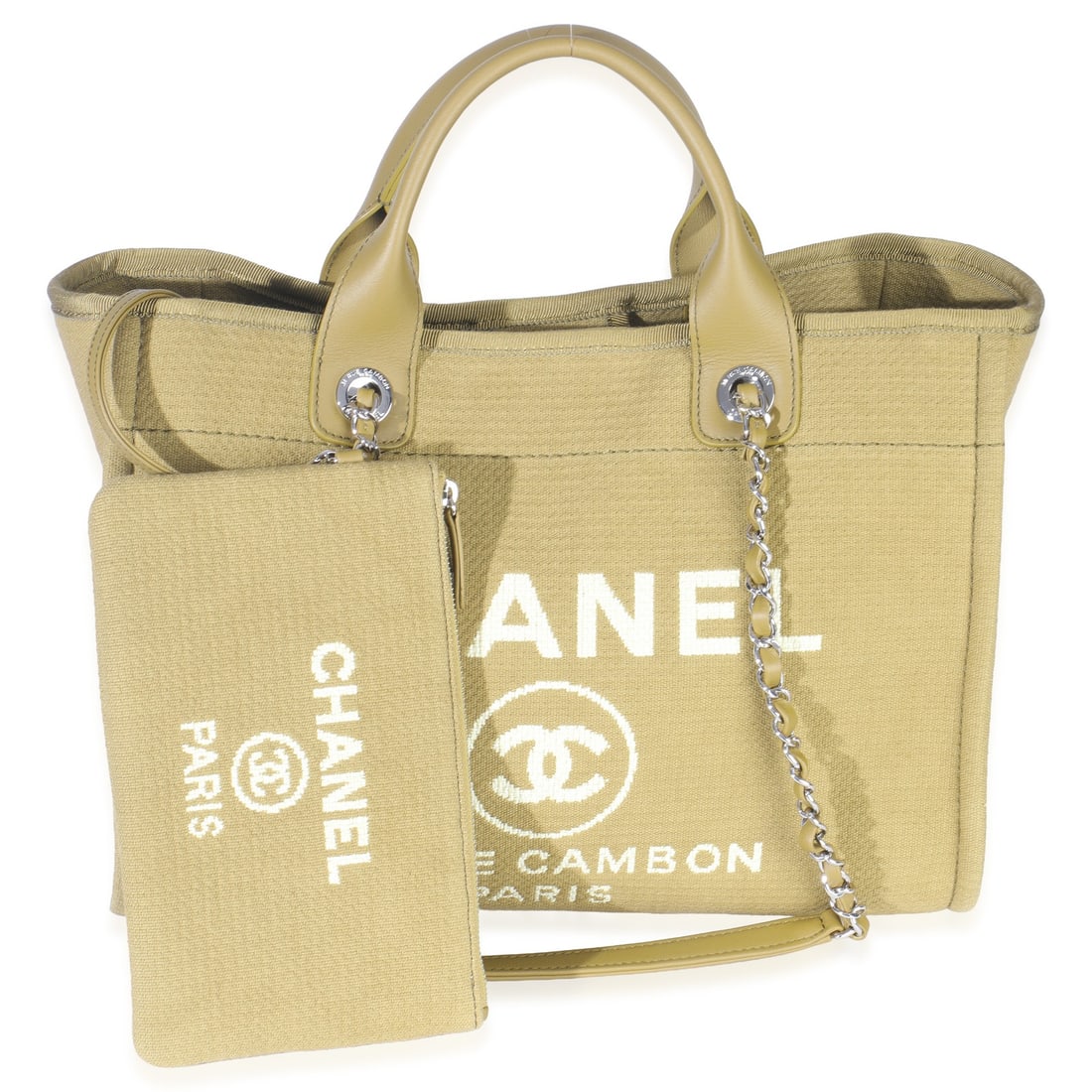 Large Deauville Tote Bag in Green Canvas by Chanel with Dustbag: Large Deauville Tote Bag in Green Canvas by Chanel with Dustbag This Chanel Large Deauville Tote is crafted in green canvas with silver-tone hardware and features top handles and shoulder straps. The