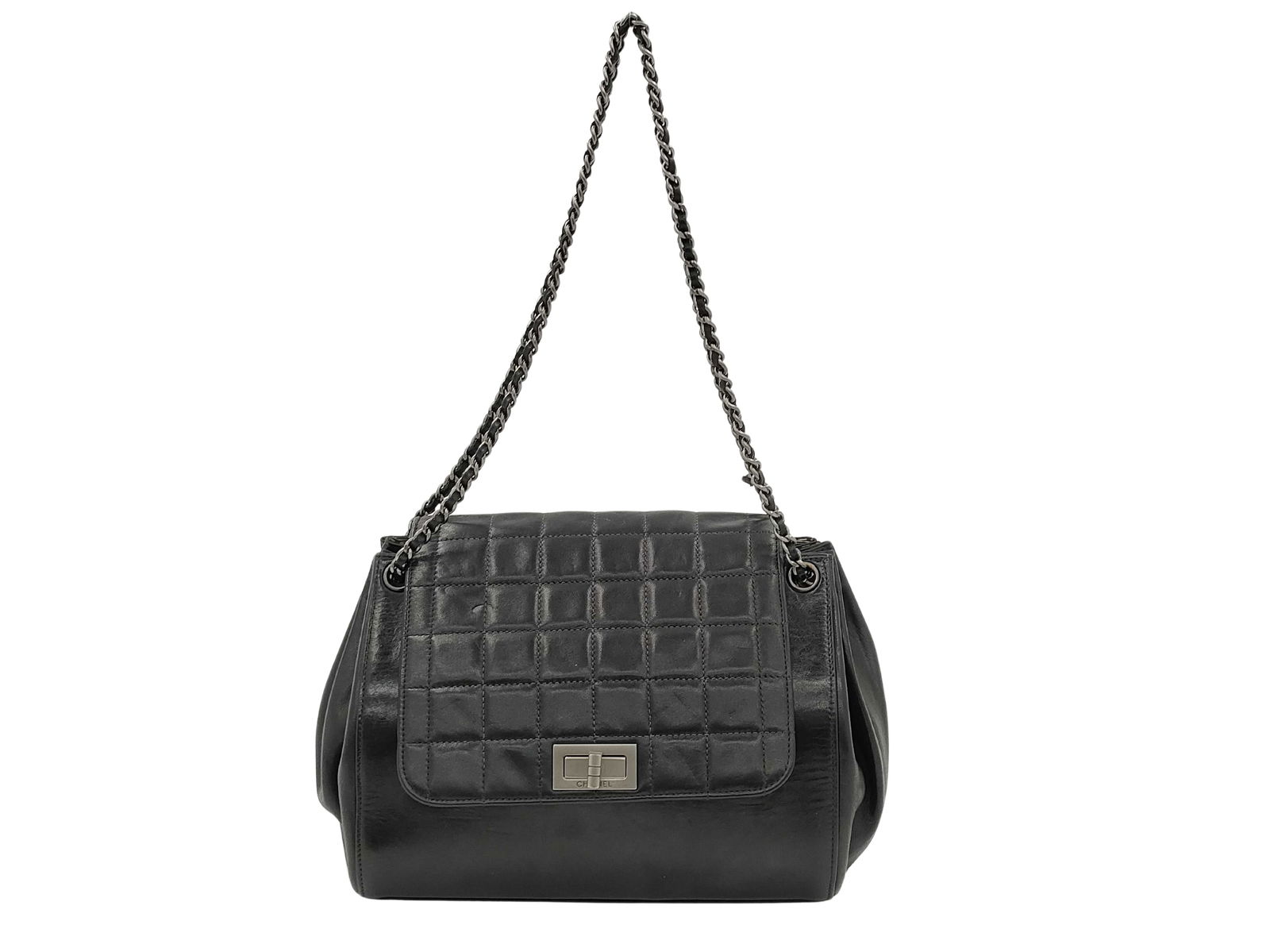 Black Leather Matelasse Bag by Chanel France: Black Leather Matelasse Bag by Chanel France This Chanel Matelasse handbag is crafted from black leather and features a classic design. The bag is designed for women and originates from France. The ex