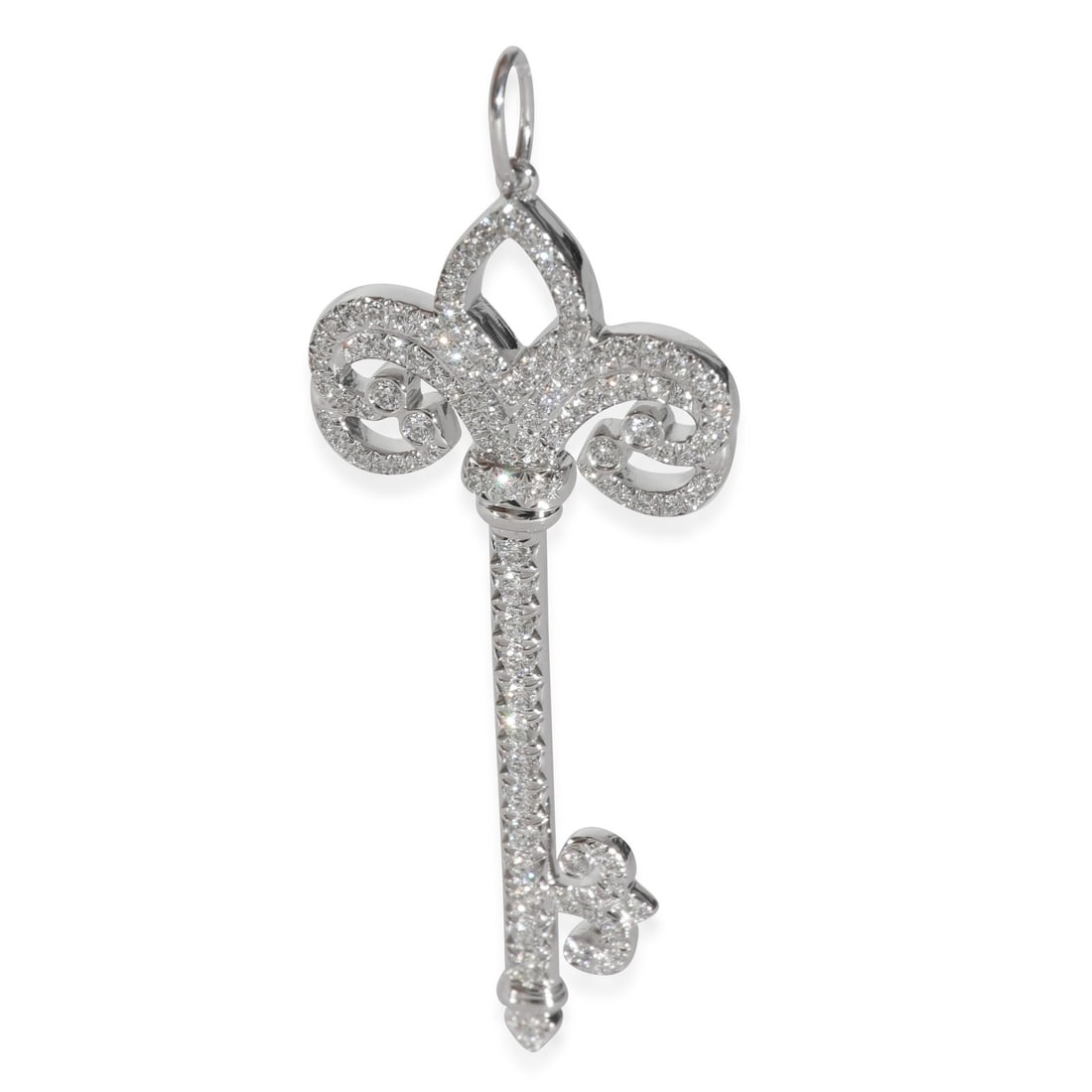 Tiffany & Co. Fleur de Lis Diamond Key Pendant Platinum 0.37 CTW: Tiffany & Co. Fleur de Lis Diamond Key Pendant Platinum 0.37 CTW This exquisite Tiffany & Co. Fleur de Lis Diamond Key Pendant features a stunning round brilliant diamond with a total weight of 0.37 c