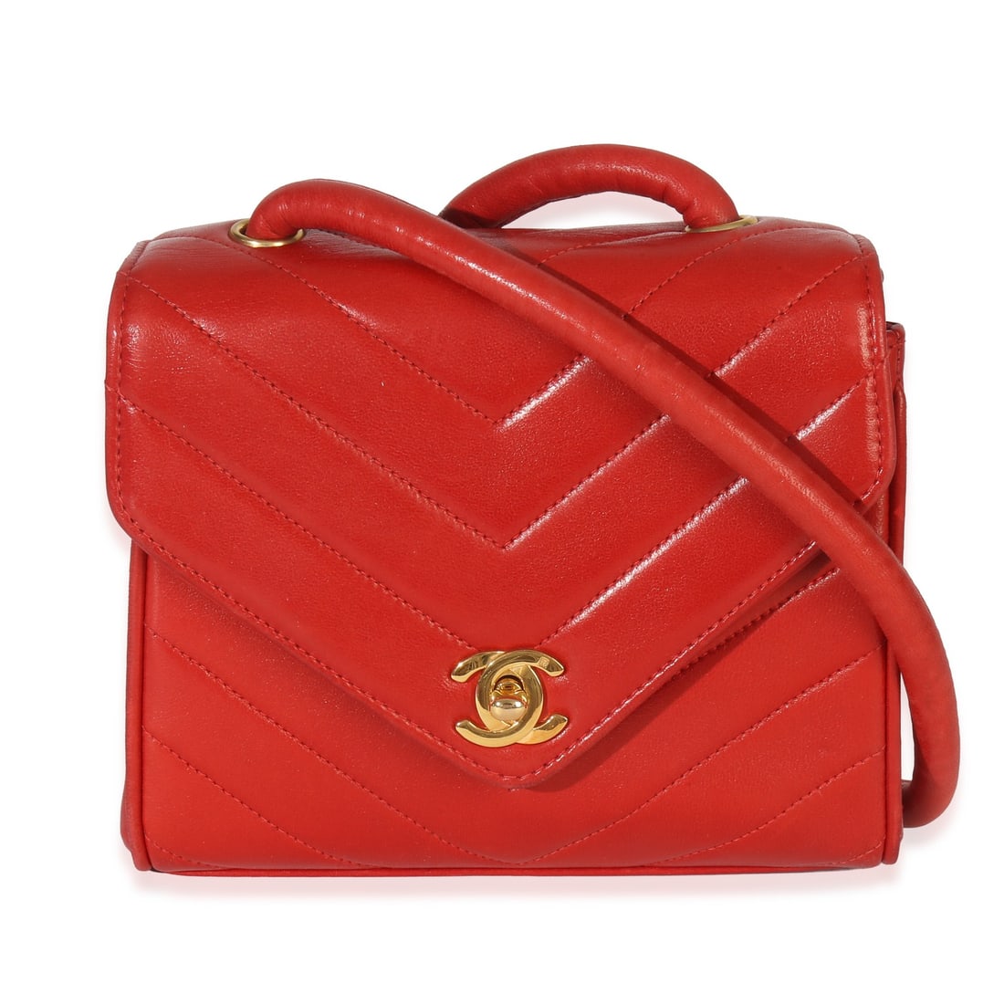 Red Chevron Lambskin Chanel CC Square Flap Shoulder Bag with Gold Tone Hardware: Red Chevron Lambskin Chanel CC Square Flap Shoulder Bag with Gold Tone Hardware This vintage Chanel CC Square Flap Bag features red chevron-quilted lambskin leather and gold-tone hardware. Designed as