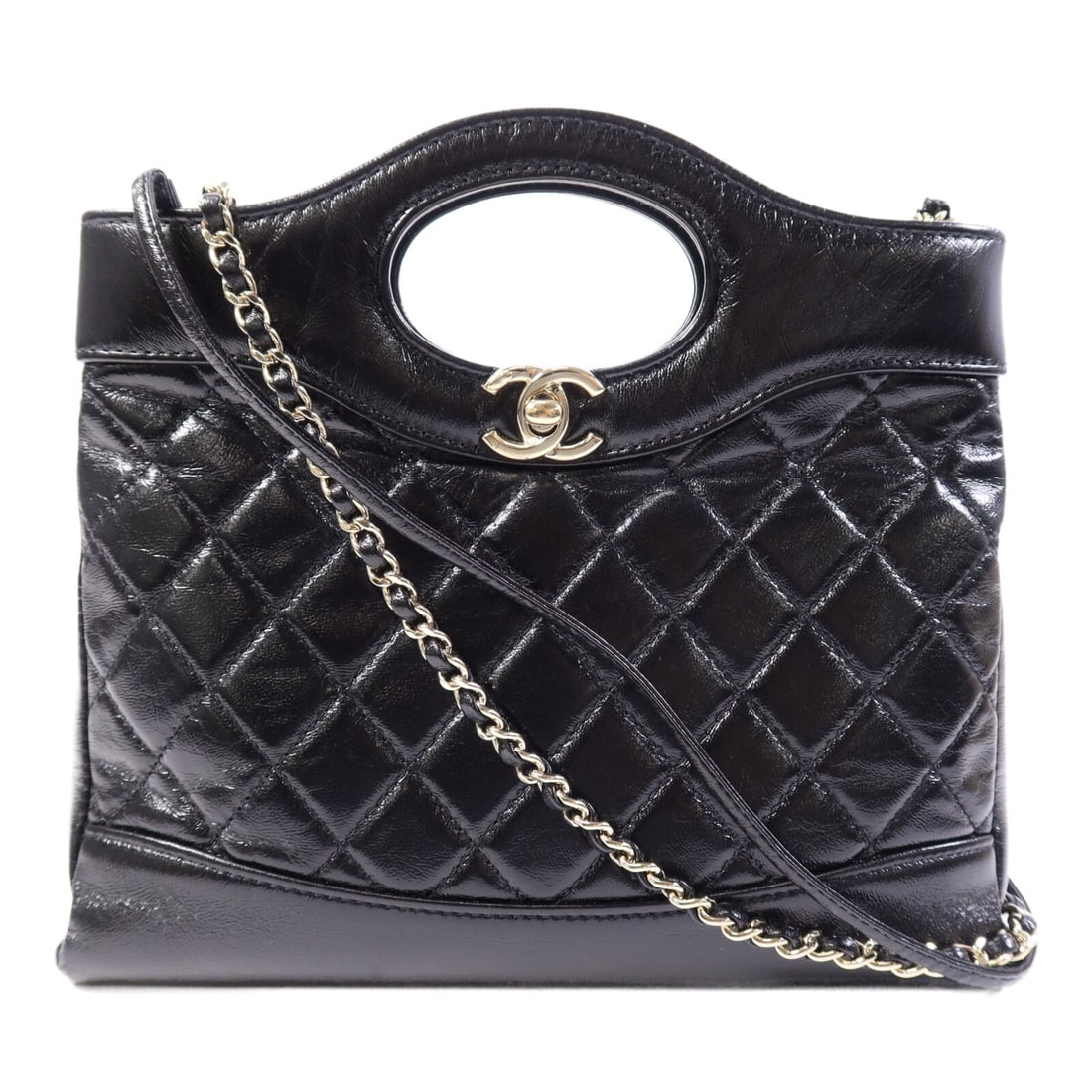 Chanel 31 Black Calfskin Shoulder Bag with CC Gold Hardware AS4133: Chanel 31 Black Calfskin Shoulder Bag with CC Gold Hardware AS4133 This Chanel 31 shoulder bag features elegant black calfskin leather and is designed with a CC accent and gold tone hardware. It offer