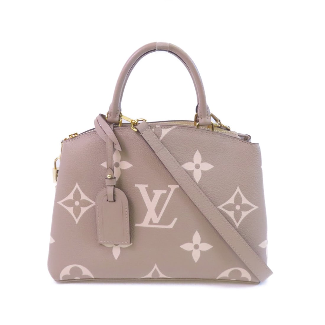 Louis Vuitton Petit Palais PM 2-Way Shoulder Bag Monogram Empreinte Beige: Louis Vuitton Petit Palais PM 2-Way Shoulder Bag Monogram Empreinte Beige This Louis Vuitton Petit Palais PM is a versatile 2-way shoulder bag crafted from beige Monogram Empreinte calfskin. Made in F