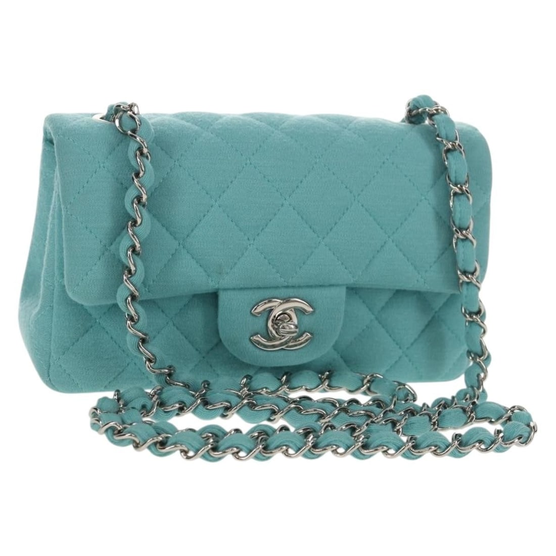 CHANEL Matelasse 20 Chain Bag Turquoise Blue Silver Authentic: CHANEL Matelasse 20 Chain Bag Turquoise Blue Silver Authentic The CHANEL Matelasse 20 Chain Bag showcases a stunning turquoise blue cotton exterior with silver accents, perfect for adding a pop of col