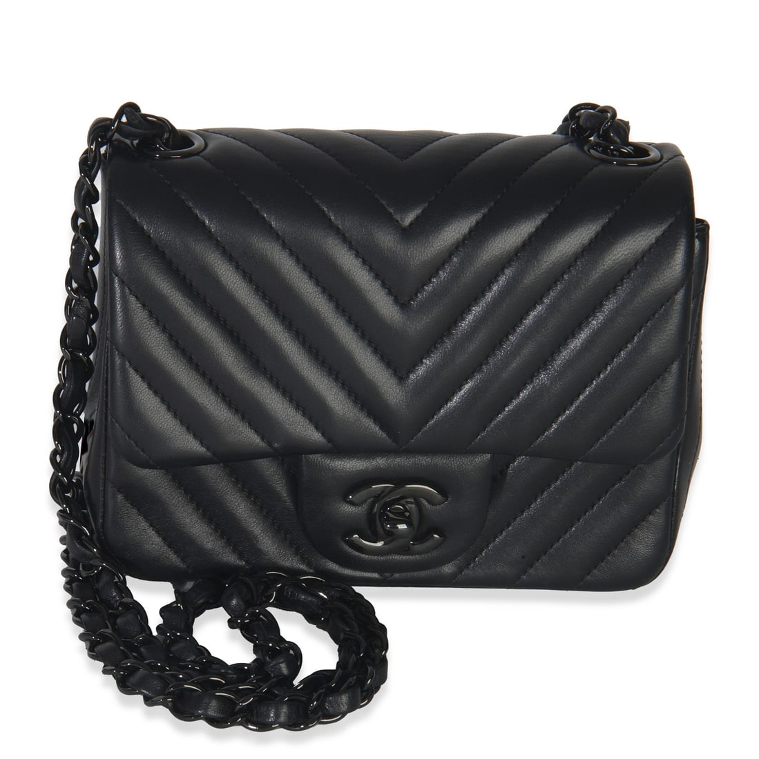 Chanel Mini Square Chevron Lambskin Flap Bag in Black with Dustbag: Chanel Mini Square Chevron Lambskin Flap Bag in Black with Dustbag This Chanel So Black Chevron Lambskin Mini Square Flap Bag features a black leather exterior with a chevron pattern, complemented by