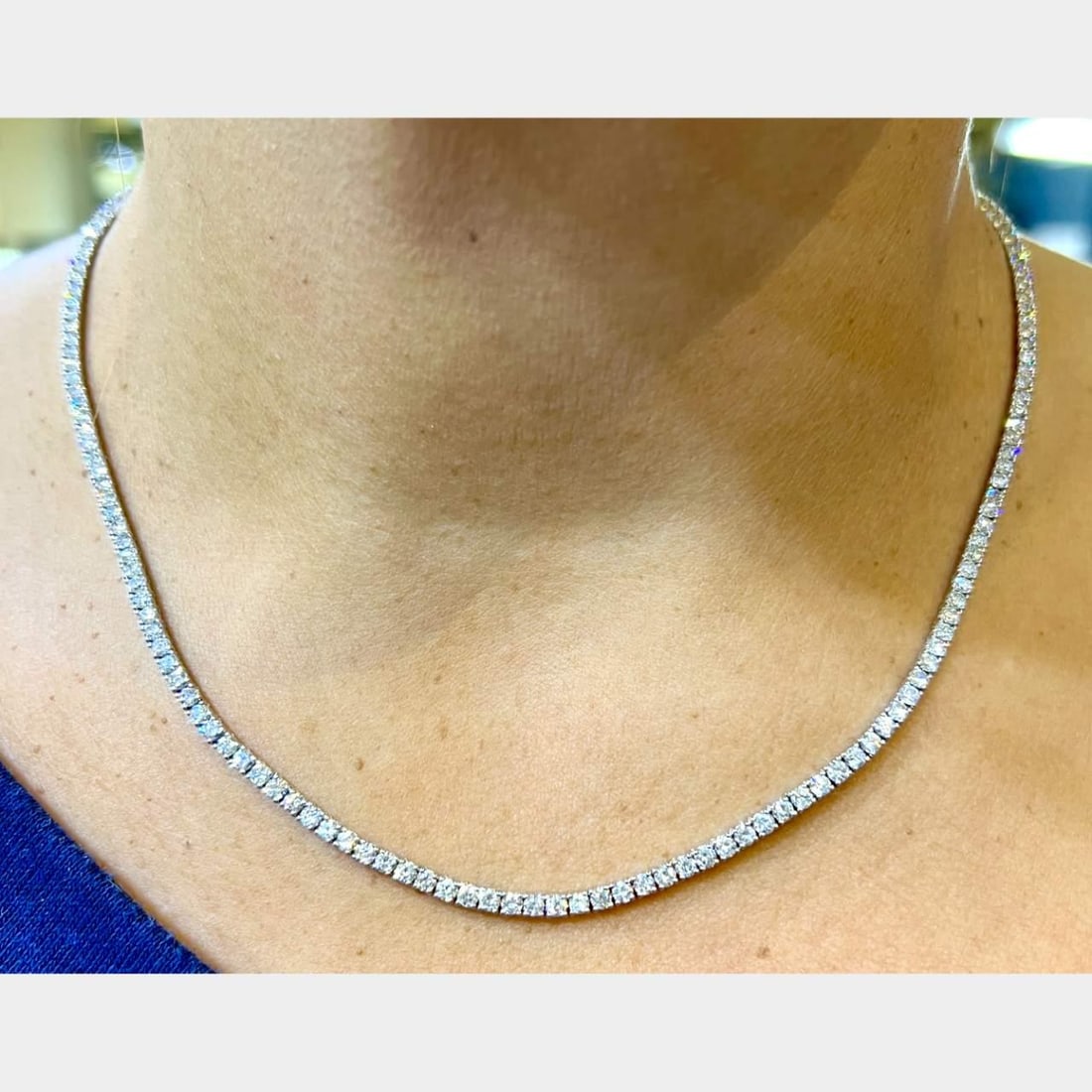 14K White Gold Tennis Necklace 10.60 Ct Diamonds 182 Stones F-H VS1-VS2: 14K White Gold Tennis Necklace 10.60 Ct Diamonds 182 Stones F-H VS1-VS2 This exquisite 14K White Gold Tennis Necklace features a stunning array of 182 diamonds, totaling approximately 10.60 carats. Th
