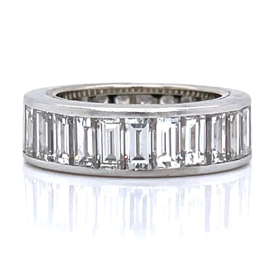 Art Deco Platinum Eternity Band 27 Baguette Diamonds 8.00 Ct: Art Deco Platinum Eternity Band 27 Baguette Diamonds 8.00 Ct This exquisite Art Deco eternity band showcases a stunning arrangement of 27 baguette diamonds, totaling approximately 8.00 carats. Crafted