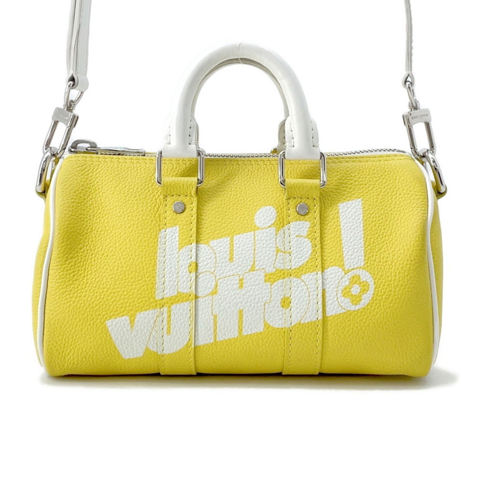 Yellow Leather Keepall XS Bag by Louis Vuitton France: Yellow Leather Keepall XS Bag by Louis Vuitton France This Louis Vuitton Keepall XS is crafted from yellow leather and features a compact silhouette. Designed for versatile use, it is suitable for any