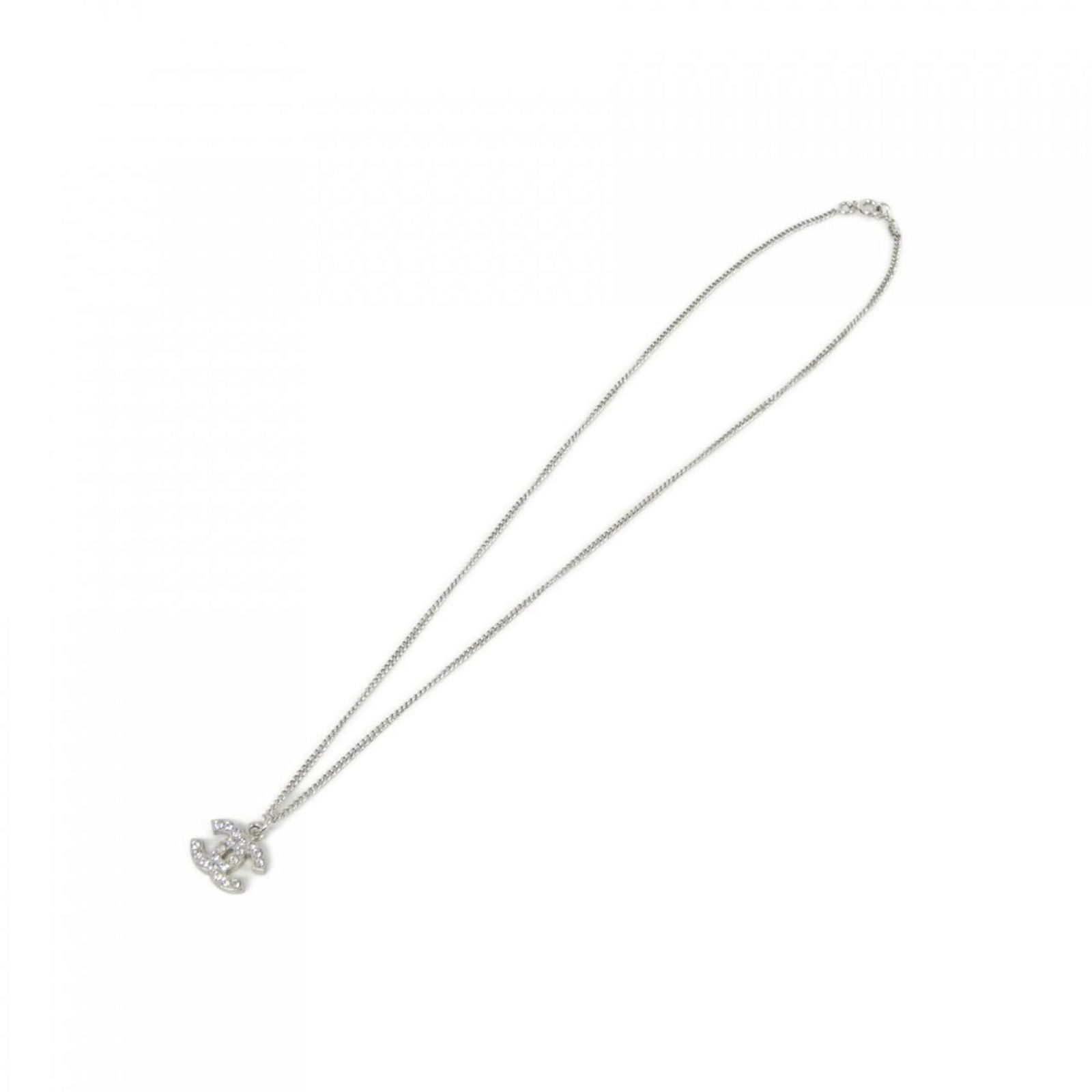 Coco Mark pendant necklace in silver tone metal by Chanel: Coco Mark pendant necklace in silver tone metal by Chanel This Chanel Coco Mark necklace features a silver-tone metal construction with a classic design. The necklace is designed for women and measure