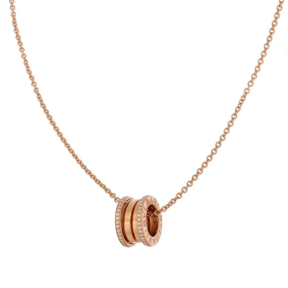 Bvlgari B. Zero1 Mini Pendant & Chain 18k Rose Gold Diamonds: Bvlgari B. Zero1 Mini Pendant & Chain 18k Rose Gold Diamonds This exquisite mini pendant and chain from the B.zero1 Collection by Bvlgari showcases elegance and authenticity. Crafted from 18k rose gol