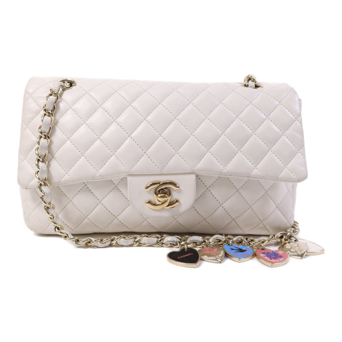 White Lambskin Classique Valentine Shoulder Bag by CHANEL with CC Gold Hardware: White Lambskin Classique Valentine Shoulder Bag by CHANEL with CC Gold Hardware This CHANEL CC Classique Valentine shoulder bag features luxurious white lambskin leather and elegant gold tone hardware