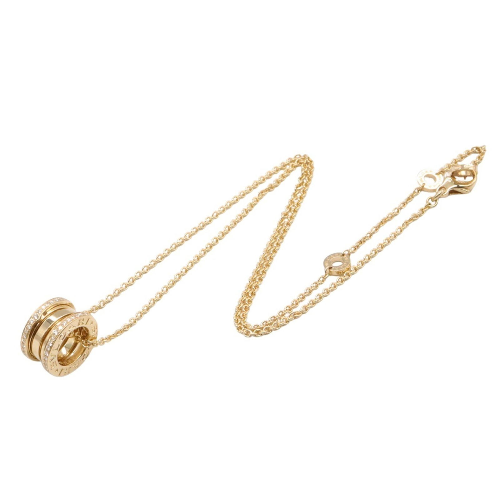 Yellow Gold B.Zero1 Necklace by Bulgari Adjustable Length: Yellow Gold B.Zero1 Necklace by Bulgari Adjustable Length This Bulgari B.Zero1 necklace features a yellow gold design, suitable for women. The main body shows traces of use with slight scratches and h