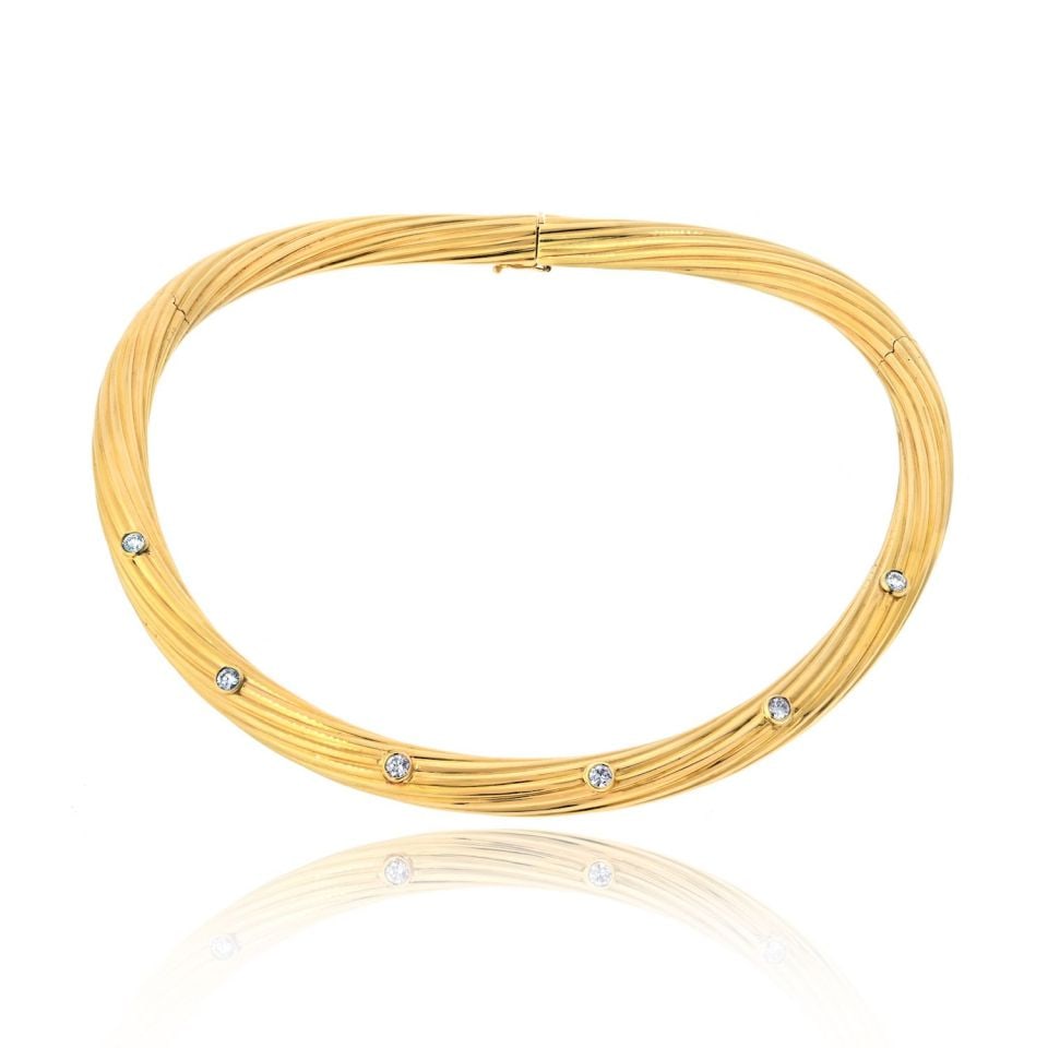 Cartier 18K Yellow Gold Diamond Choker Necklace 1.5 Cts Fluted Twist: Cartier 18K Yellow Gold Diamond Choker Necklace 1.5 Cts Fluted Twist This exquisite Cartier choker necklace features a stunning fluted twist design crafted from luxurious 18K yellow gold. Weighing app