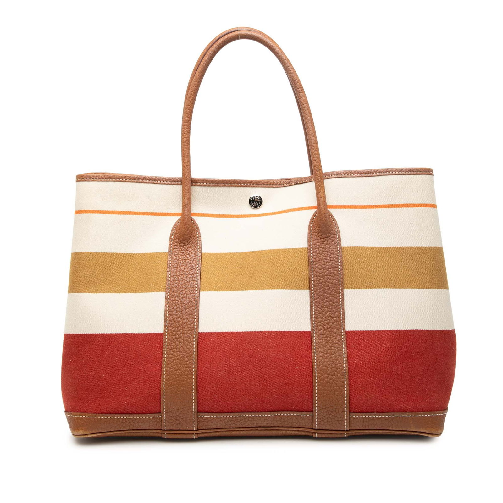 Toile and Negonda Striped Garden Party 36 handbag by Hermes: Toile and Negonda Striped Garden Party 36 handbag by Hermes This Hermes Garden Party 36 tote features a canvas body with Negonda leather trim, rolled leather handles, and an open top secured by a snap