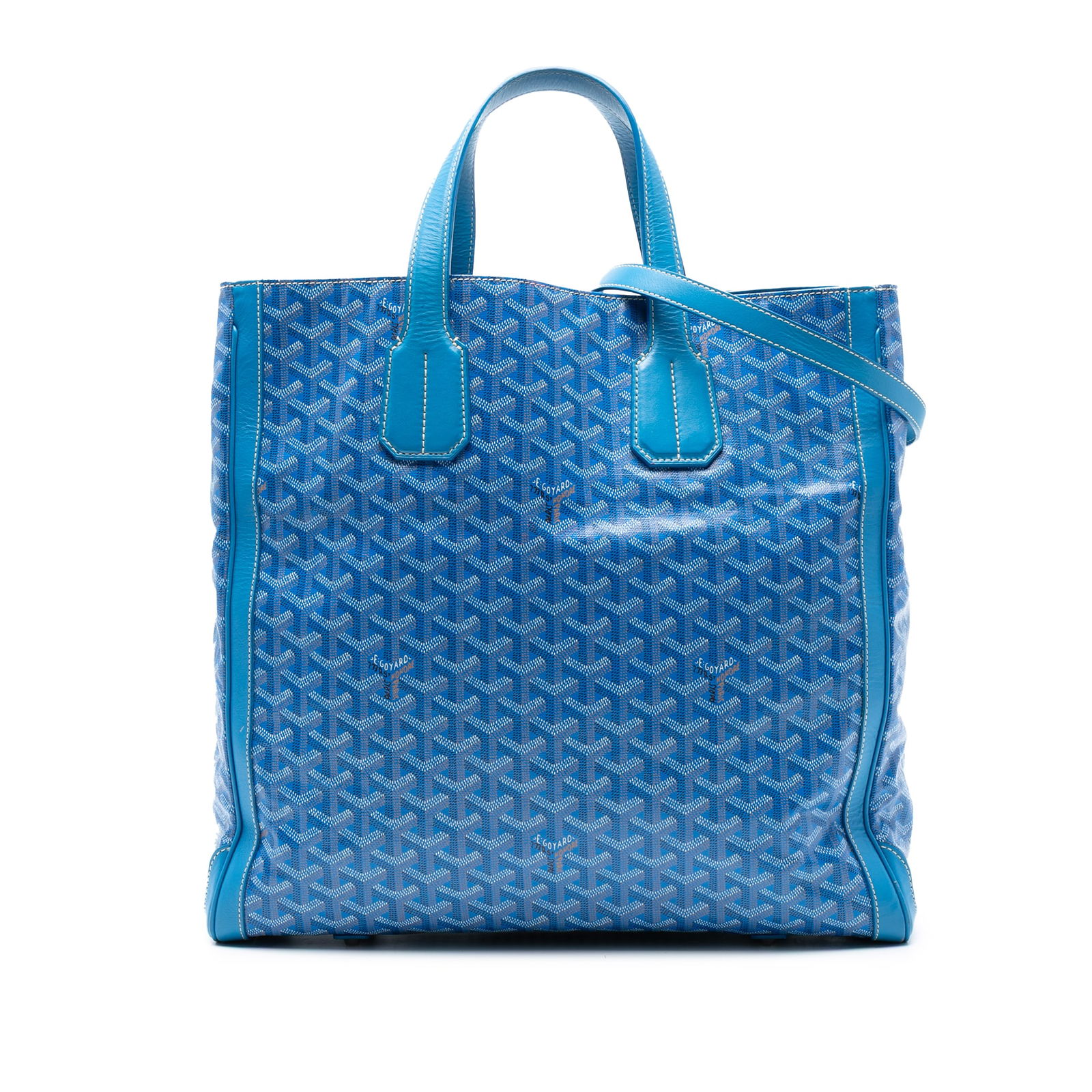 Goyard Goyardine Voltaire Blue Coated Canvas Bag with Leather Trim: Goyard Goyardine Voltaire Blue Coated Canvas Bag with Leather Trim The Goyardine Voltaire is an elegant bag crafted from coated canvas with luxurious leather trim. It features flat leather handles and