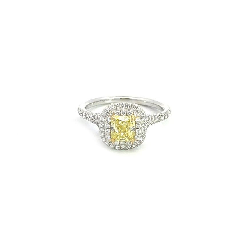 Tiffany & Co. 1.07ct Fancy Intense Yellow Diamond Platinum Gold Ring: Tiffany & Co. 1.07ct Fancy Intense Yellow Diamond Platinum Gold Ring Presenting a breathtaking Tiffany & Co. engagement ring, expertly crafted from platinum with a polished finish. This exquisite piec
