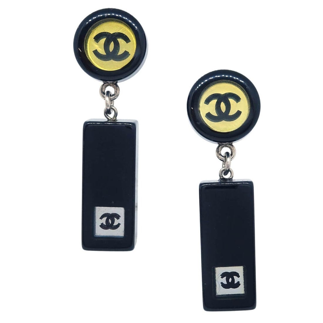 Chanel Silver Plated Dangle Button Piercing Earrings 01P: Chanel Silver Plated Dangle Button Piercing Earrings 01P Elevate your style with these stunning Chanel Dangle Piercing Earrings. Crafted with a sleek silver plated finish, these earrings feature a con
