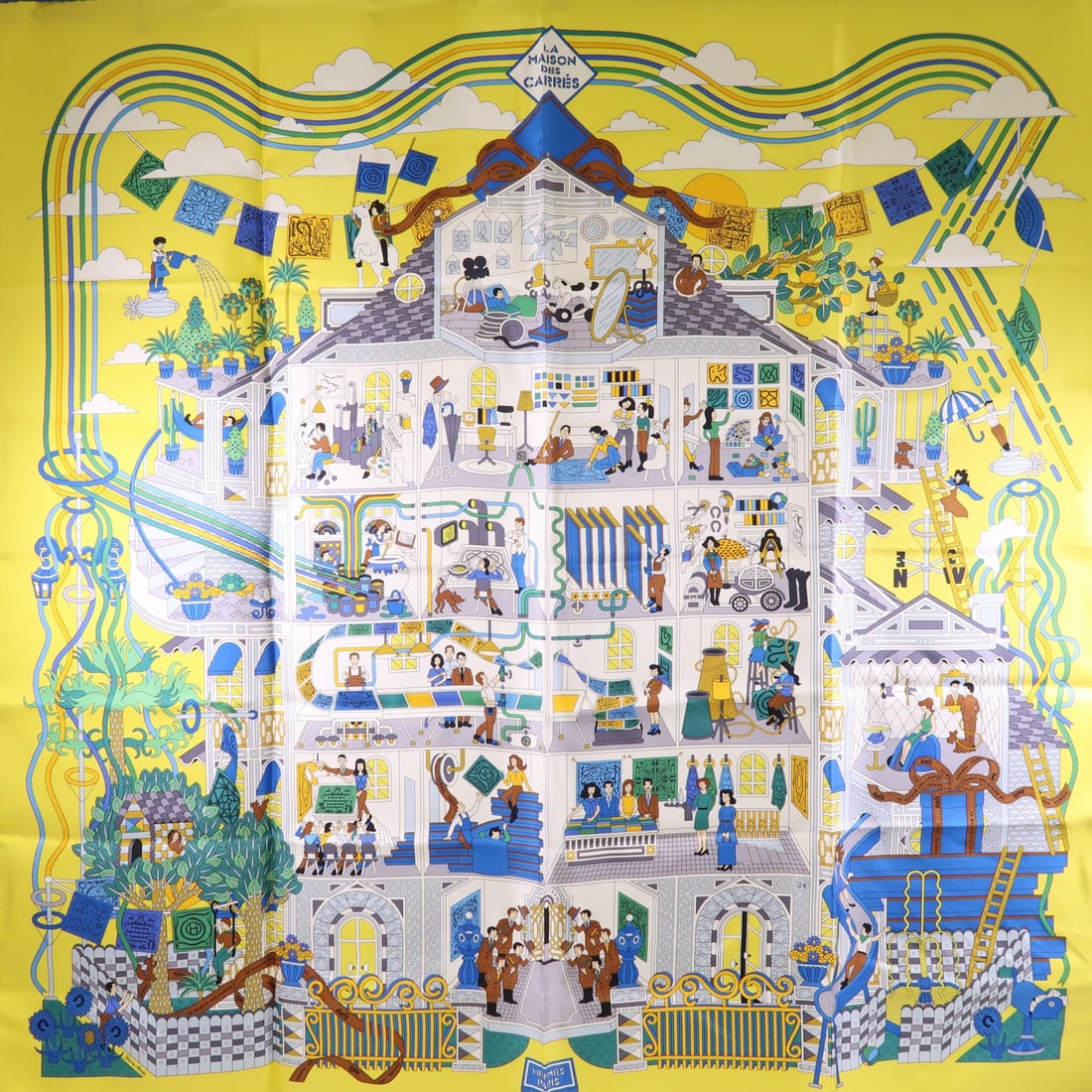 HERMES Silk Scarf in Yellow and Blue from France: HERMES Silk Scarf in Yellow and Blue from France This elegant HERMES scarf showcases a vibrant yellow color with blue accents, crafted from luxurious silk. It is designed in a regular size, making it