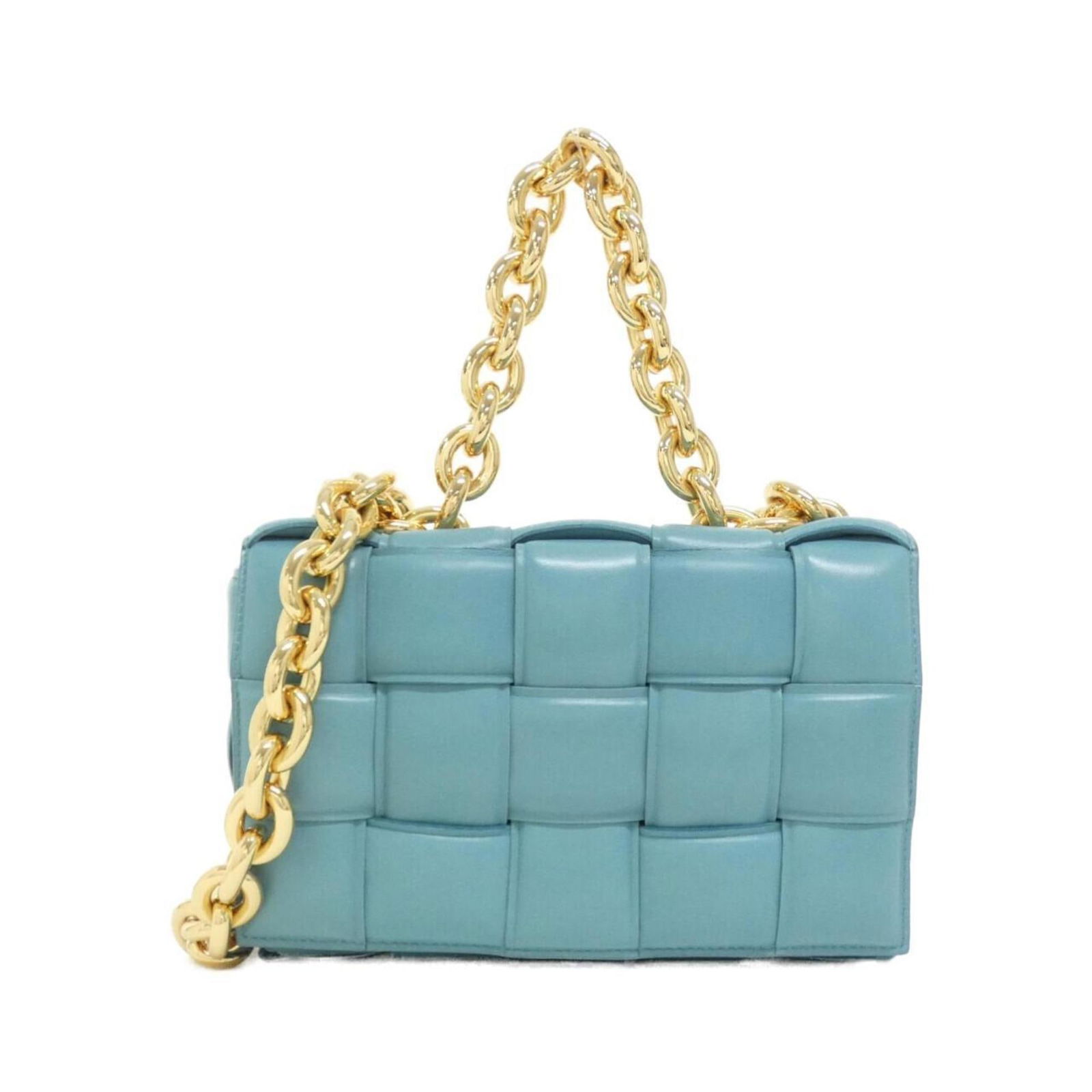 Blue Leather Cassette Bag by Bottega Veneta Italy: Blue Leather Cassette Bag by Bottega Veneta Italy This Bottega Veneta Cassette bag is crafted from blue leather and features a stylish design suitable for women. Made in Italy, it showcases the brand'