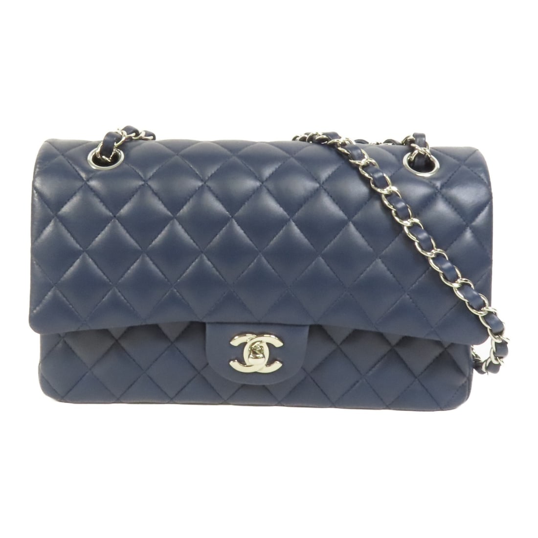 Navy Lambskin Classic 25 Shoulder Bag by CHANEL with Silver Tone CC Hardware: Navy Lambskin Classic 25 Shoulder Bag by CHANEL with Silver Tone CC Hardware This CHANEL Classic 25 chain shoulder bag features a sophisticated design crafted from navy lambskin leather. The bag is ac