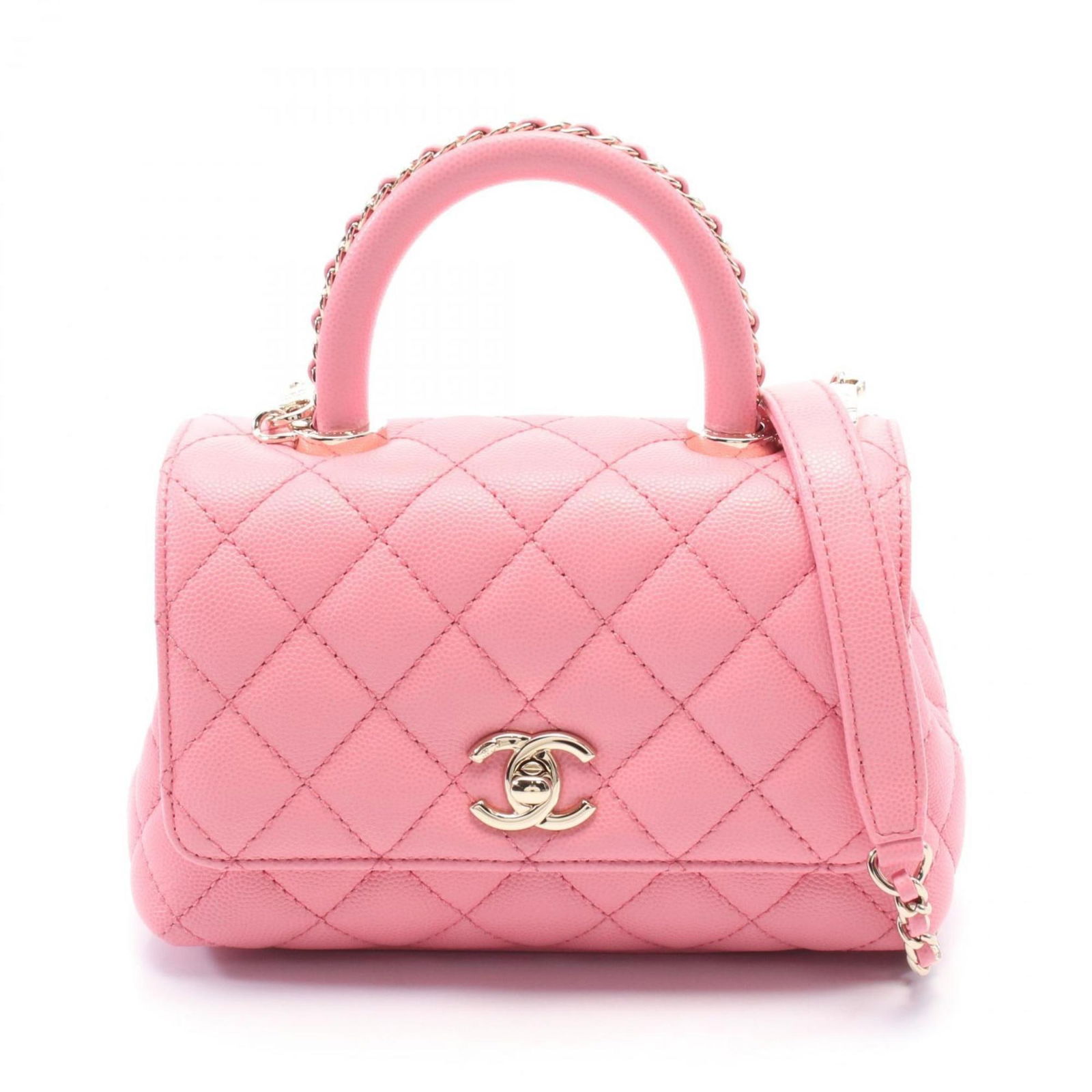 Pink Leather Chanel Coco Handle Bag 12cm x 18.5cm x 8.5cm: Pink Leather Chanel Coco Handle Bag 12cm x 18.5cm x 8.5cm This Chanel Coco Handle handbag features a pink leather exterior with a structured silhouette. Designed for women, it is crafted in Italy and