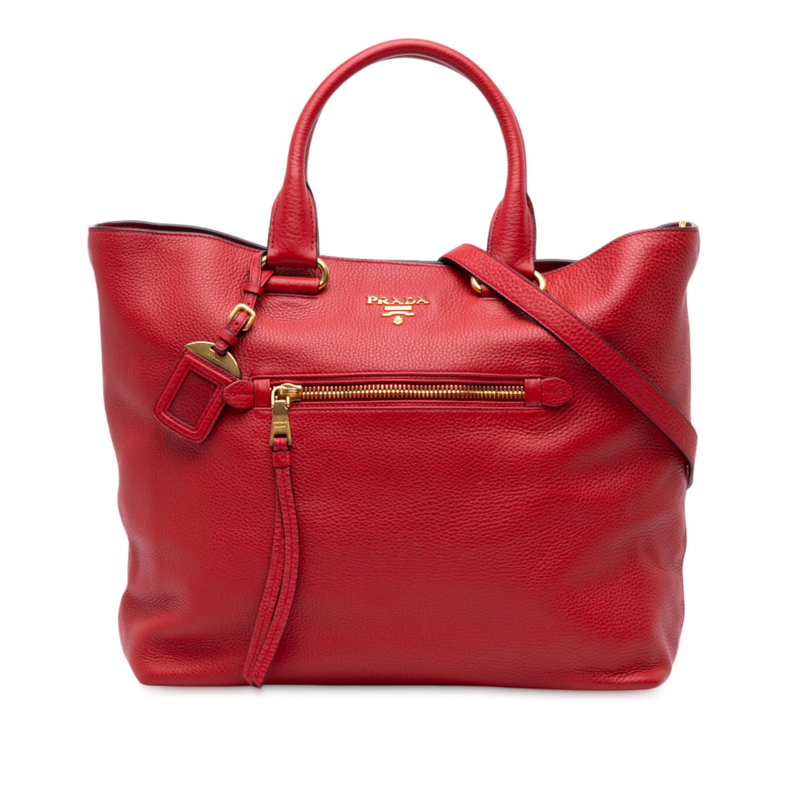 Prada Vitello Daino Red Leather Convertible Tote with Strap: Prada Vitello Daino Red Leather Convertible Tote with Strap This Prada Vitello Daino Open Convertible Tote is crafted from luxurious leather in a striking red hue. The tote features rolled leather han