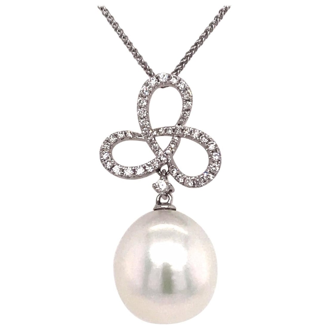 Harbor Diamonds 18K White Gold South Sea Pearl Diamond Pendant: Harbor Diamonds 18K White Gold South Sea Pearl Diamond Pendant This exquisite pendant showcases a stunning South Sea Pearl set in luxurious 18K white gold. The pendant features one round South Sea Pea