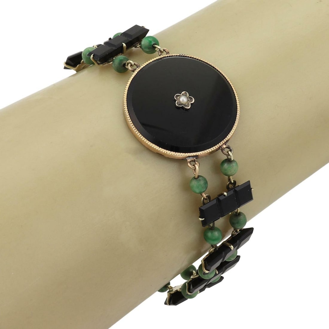 Victorian 14k Yellow Gold Jade Onyx Bead Bracelet with Seed Pearl: Victorian 14k Yellow Gold Jade Onyx Bead Bracelet with Seed Pearl This exquisite Victorian Era bracelet is beautifully crafted from 14k yellow gold. It features a striking large onyx disc set in a rou