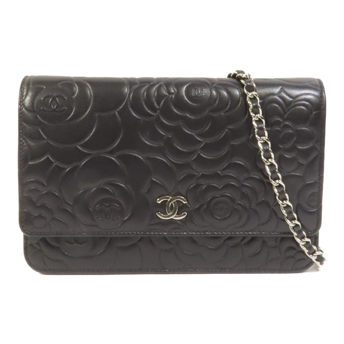 Black Lambskin Chanel Wallet on Chain Shoulder Bag with CC Silver Hardware: Black Lambskin Chanel Wallet on Chain Shoulder Bag with CC Silver Hardware This CHANEL Wallet On Chain (WOC) shoulder bag features black lambskin leather and a classic CC logo with silver-tone hardwar