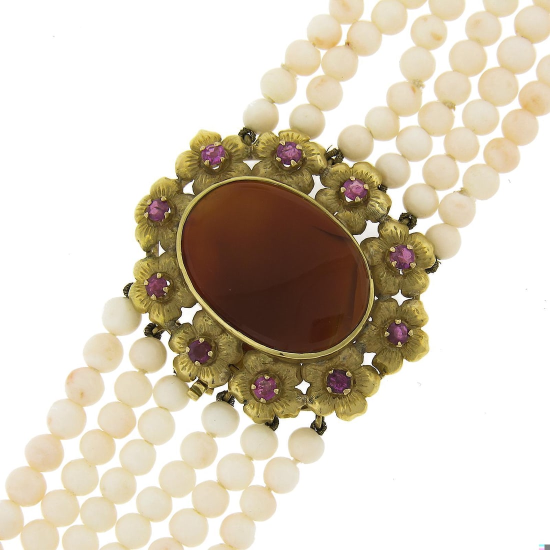 Vintage 18k Gold Multi-Strand Coral Carnelian Ruby Flower Necklace: Vintage 18k Gold Multi-Strand Coral Carnelian Ruby Flower Necklace This exquisite vintage necklace showcases a stunning layered design featuring six strands of natural angle skin coral beads, each app