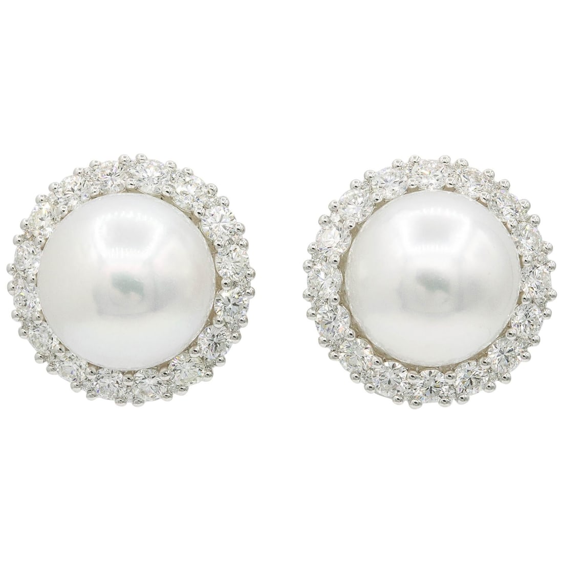 Harbor Diamonds 18K South Sea Pearl Diamond Halo Earrings 2.75 Carats: Harbor Diamonds 18K South Sea Pearl Diamond Halo Earrings 2.75 Carats Elevate your elegance with these stunning South Sea Pearl Diamond Halo Stud Earrings. Crafted from luxurious 18K white gold, each