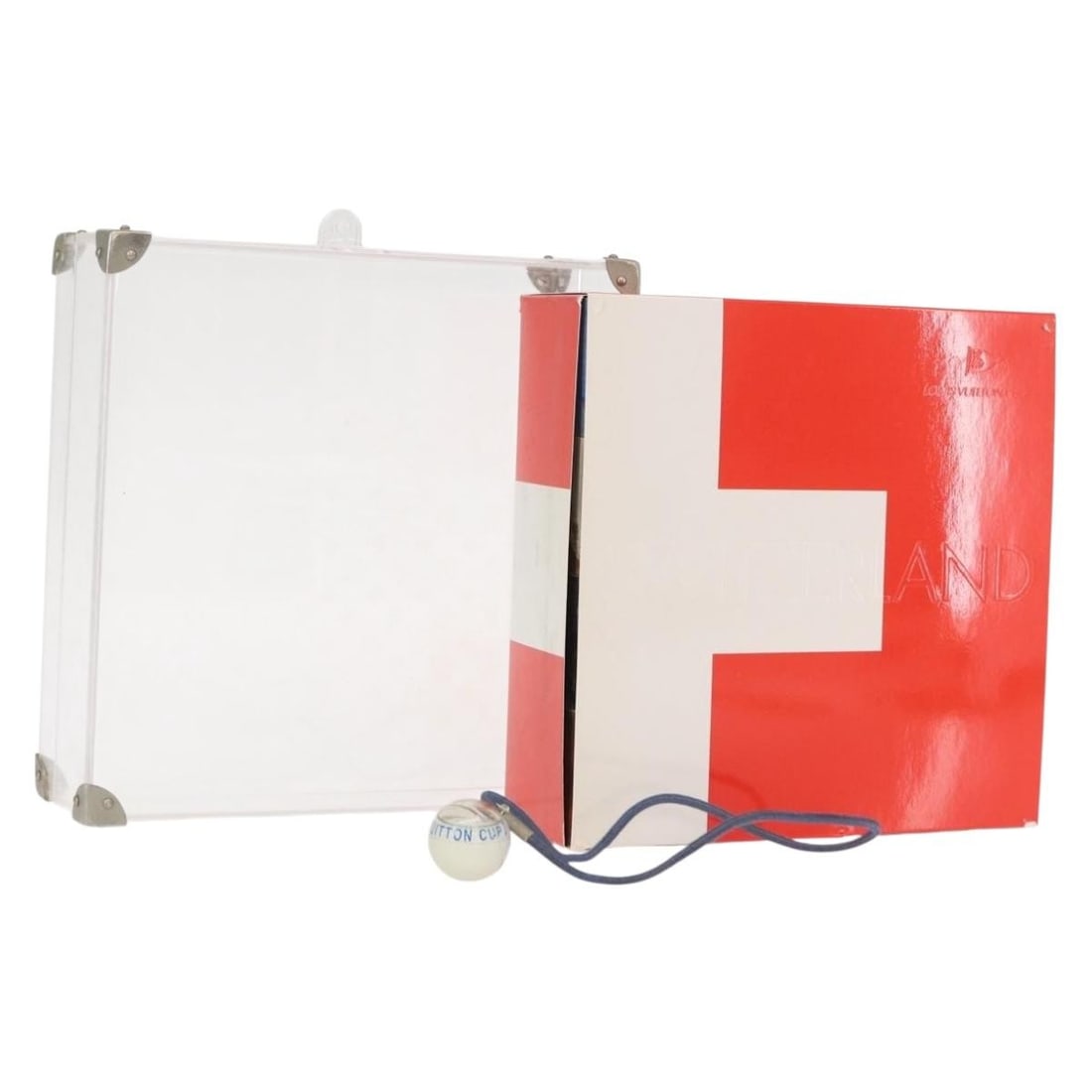 LOUIS VUITTON LV Cup Red White Paperweight Authentic: LOUIS VUITTON LV Cup Red White Paperweight Authentic This exquisite Louis Vuitton LV Cup puzzle paperweight combines functionality with a touch of luxury. Made from Louis Vuitton Cup Canvas, this piec