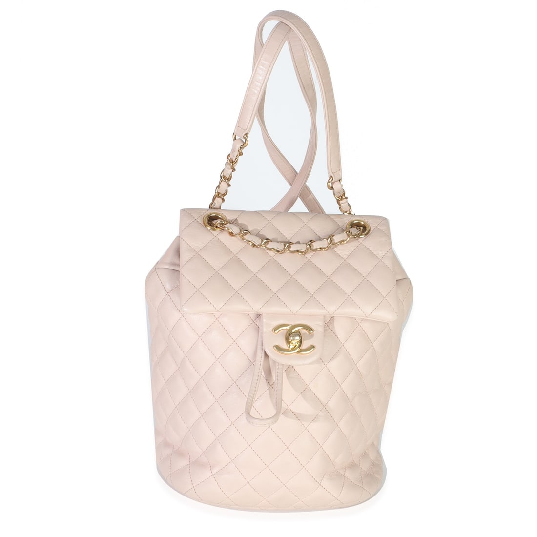 Small Urban Spirit Backpack by Chanel in Light Pink Quilted Lambskin Leather: Small Urban Spirit Backpack by Chanel in Light Pink Quilted Lambskin Leather This Chanel Small Urban Spirit Backpack features light pink quilted lambskin leather with gold-tone hardware. The design in