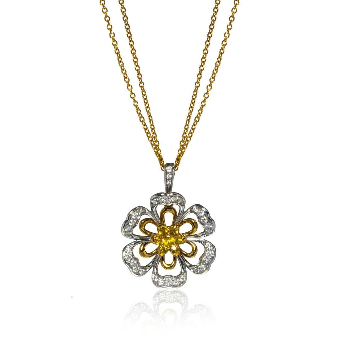Luca Carati 18K Gold Floral Pendant Necklace with Diamonds and Sapphires 0.66ct: Luca Carati 18K Gold Floral Pendant Necklace with Diamonds and Sapphires 0.66ct This exquisite pendant necklace from Luca Carati is crafted in luxurious 18K yellow and white gold. Featuring a stunning